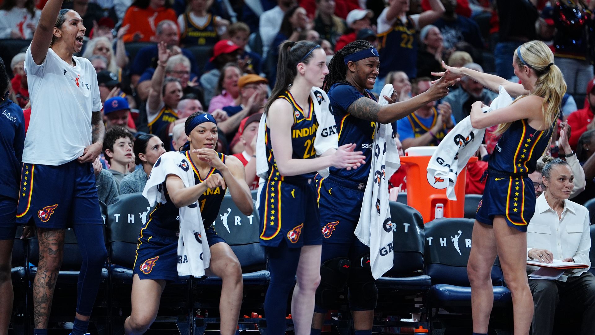 : Indiana Fever bench reacts after making a 3 point shot against the Minnesota Lynx on September 22, 2026, at Gainbridge Fieldhouse in Indianapolis, Indiana.