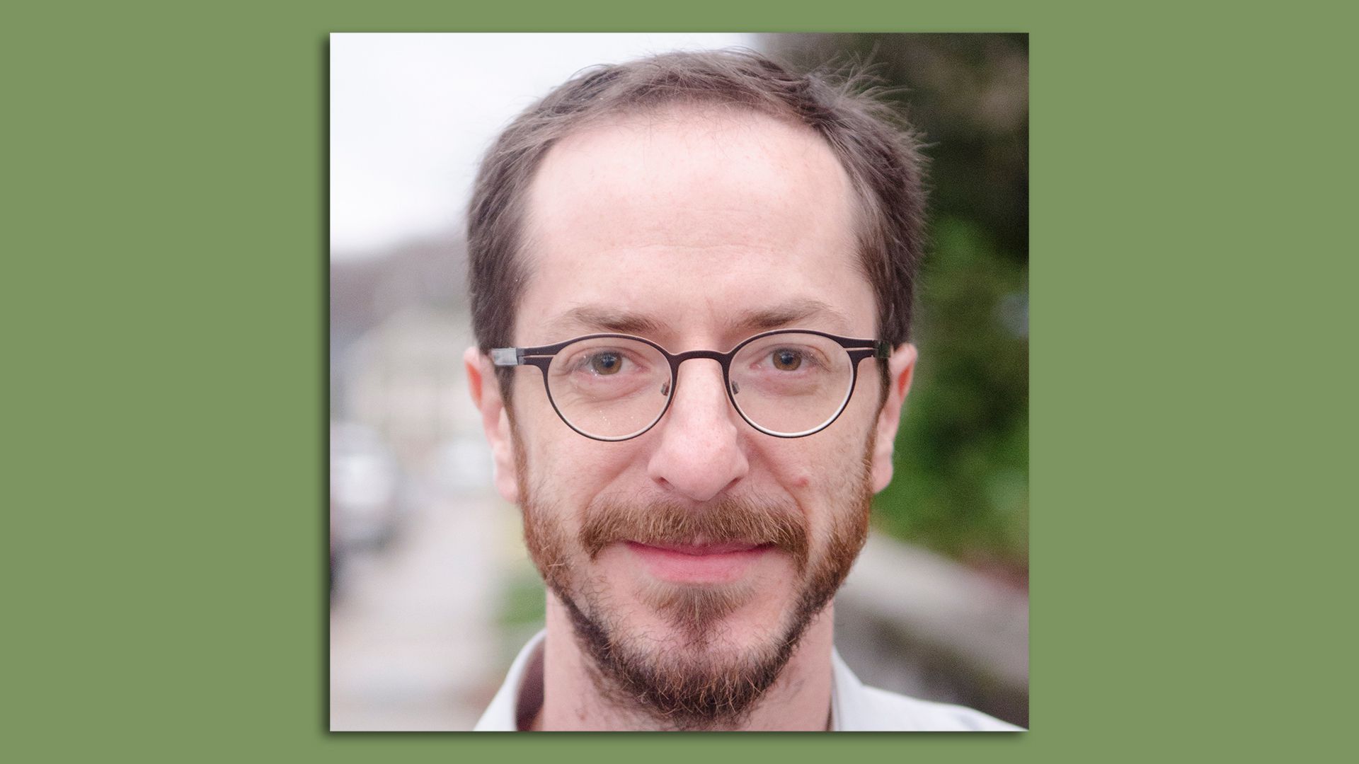 headshot on background of Freddie O'Connell