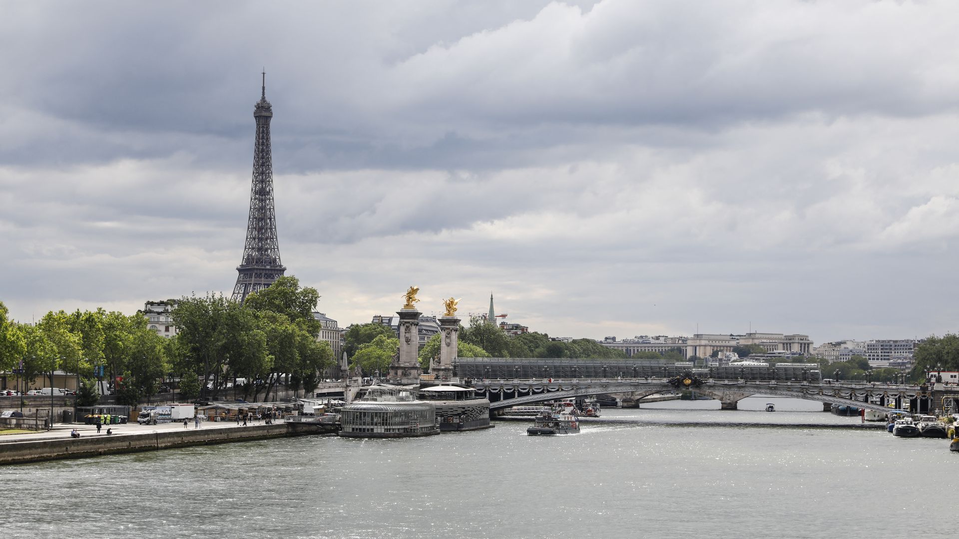 View of the Seine river, the Alexandre 3 bridge and the Eiffel Tower before the Olympic Games, at Paris, France, on June 11,