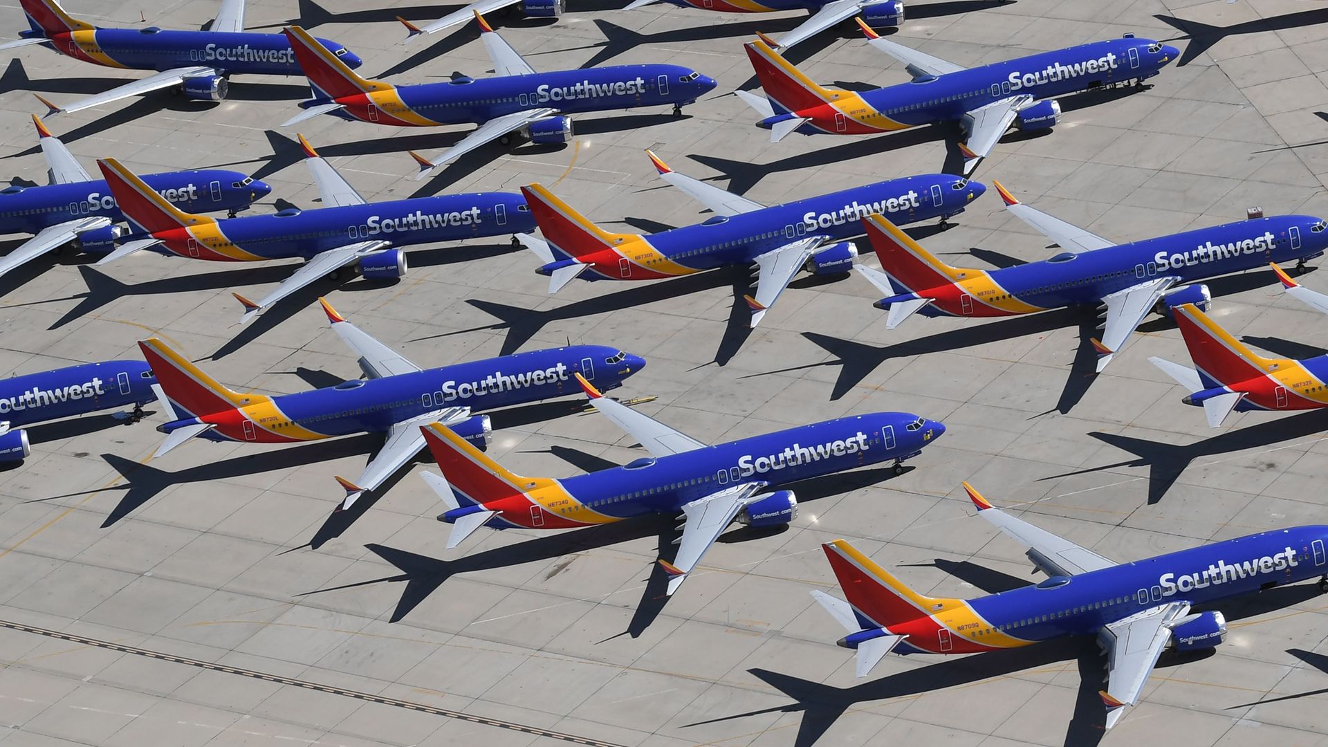 Southwest Airlines Boeing 737 MAX aircraft are parked on the tarmac after being grounded, at the Southern California Logistics Airport in Victorville, California on March 28, 2019.