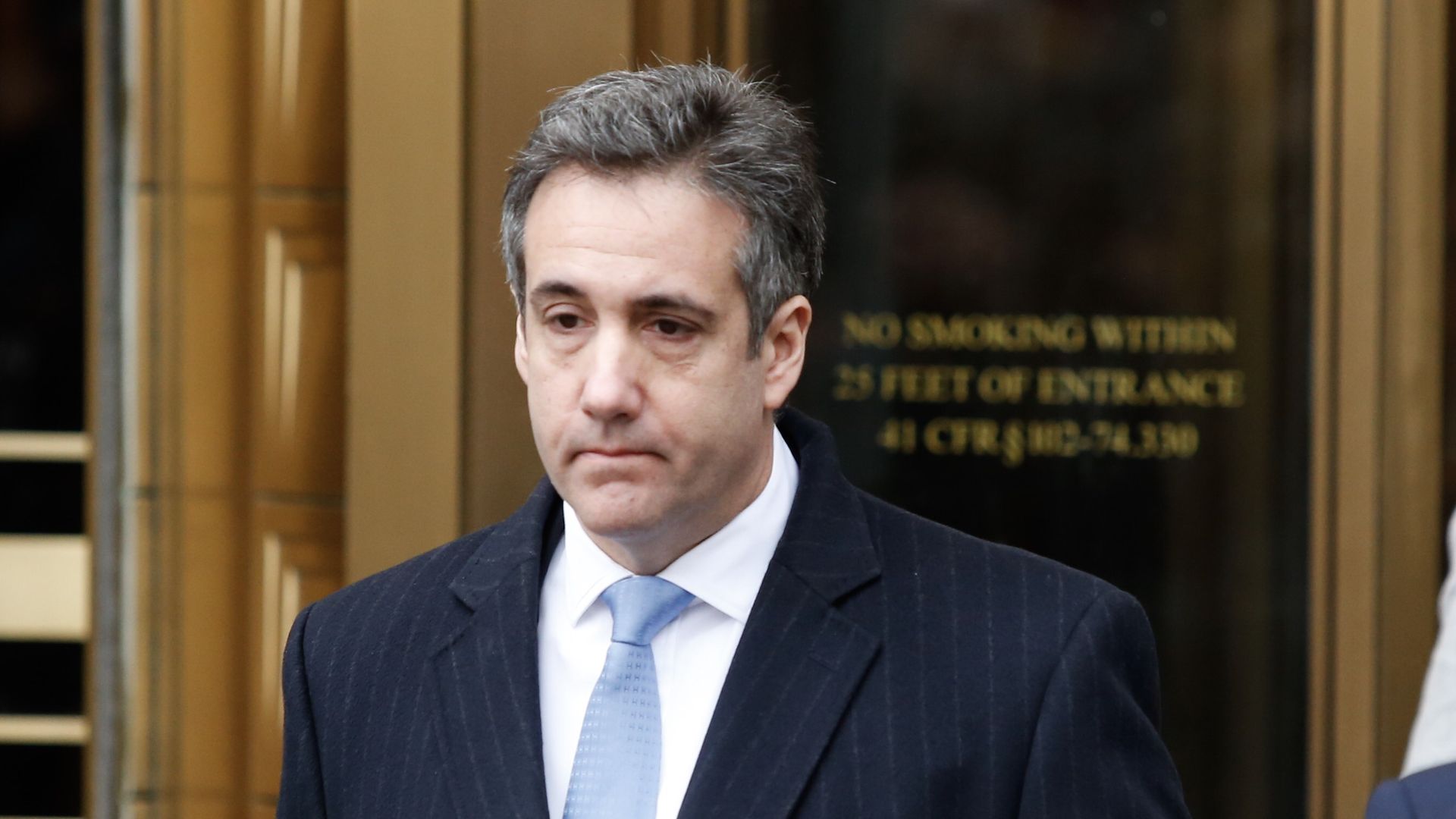 Michael Cohen looking despondent.