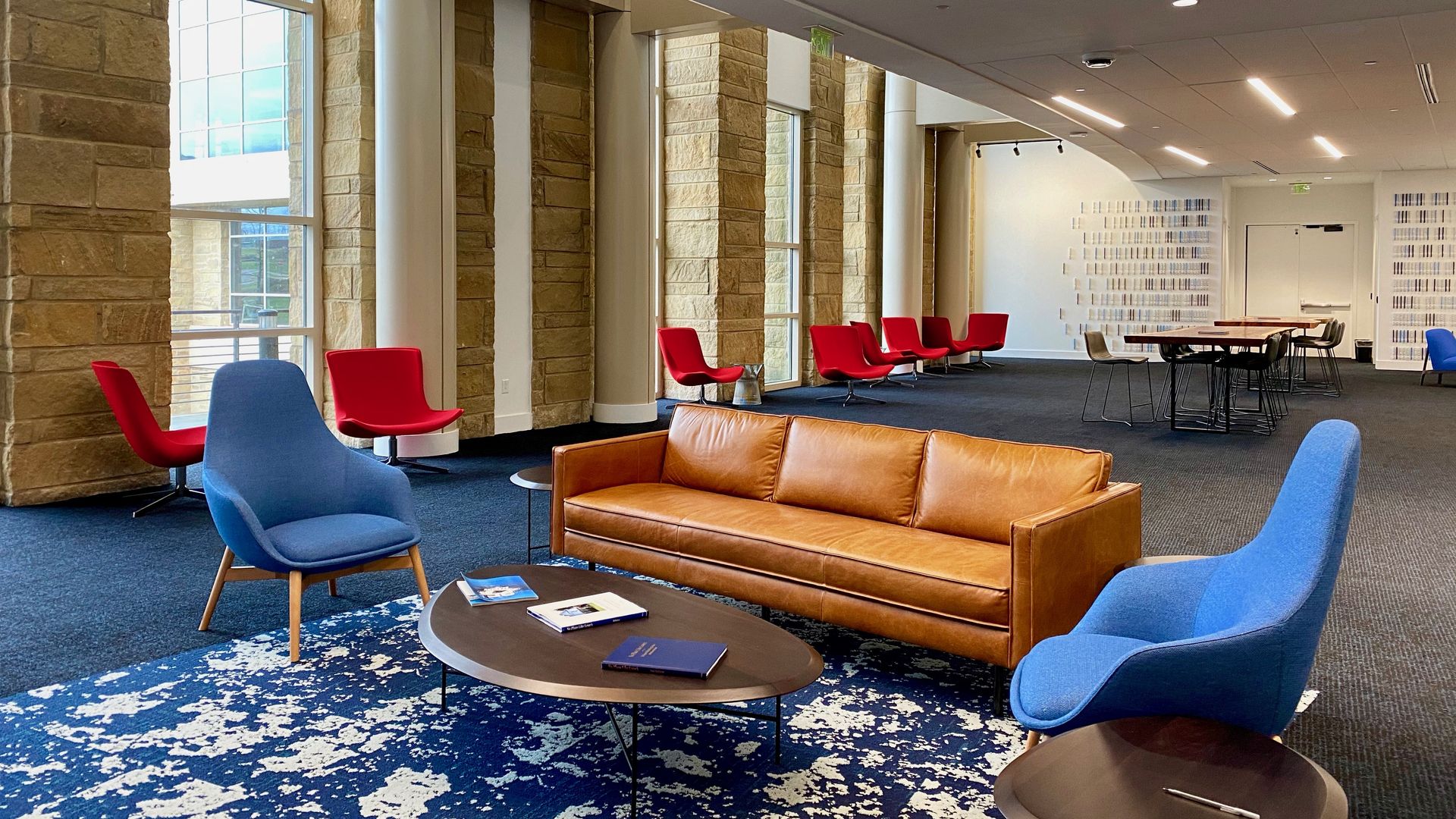 A couch and chairs inside a Lowe's office.