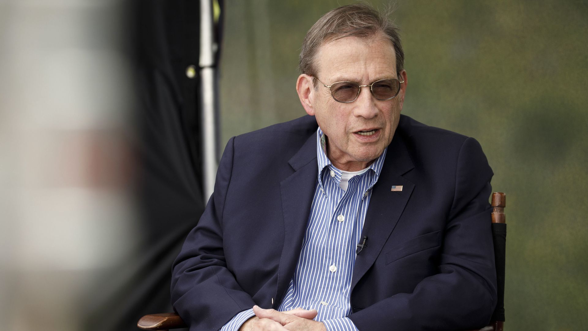 Centene CEO Michael Neidorff sits in a chair.