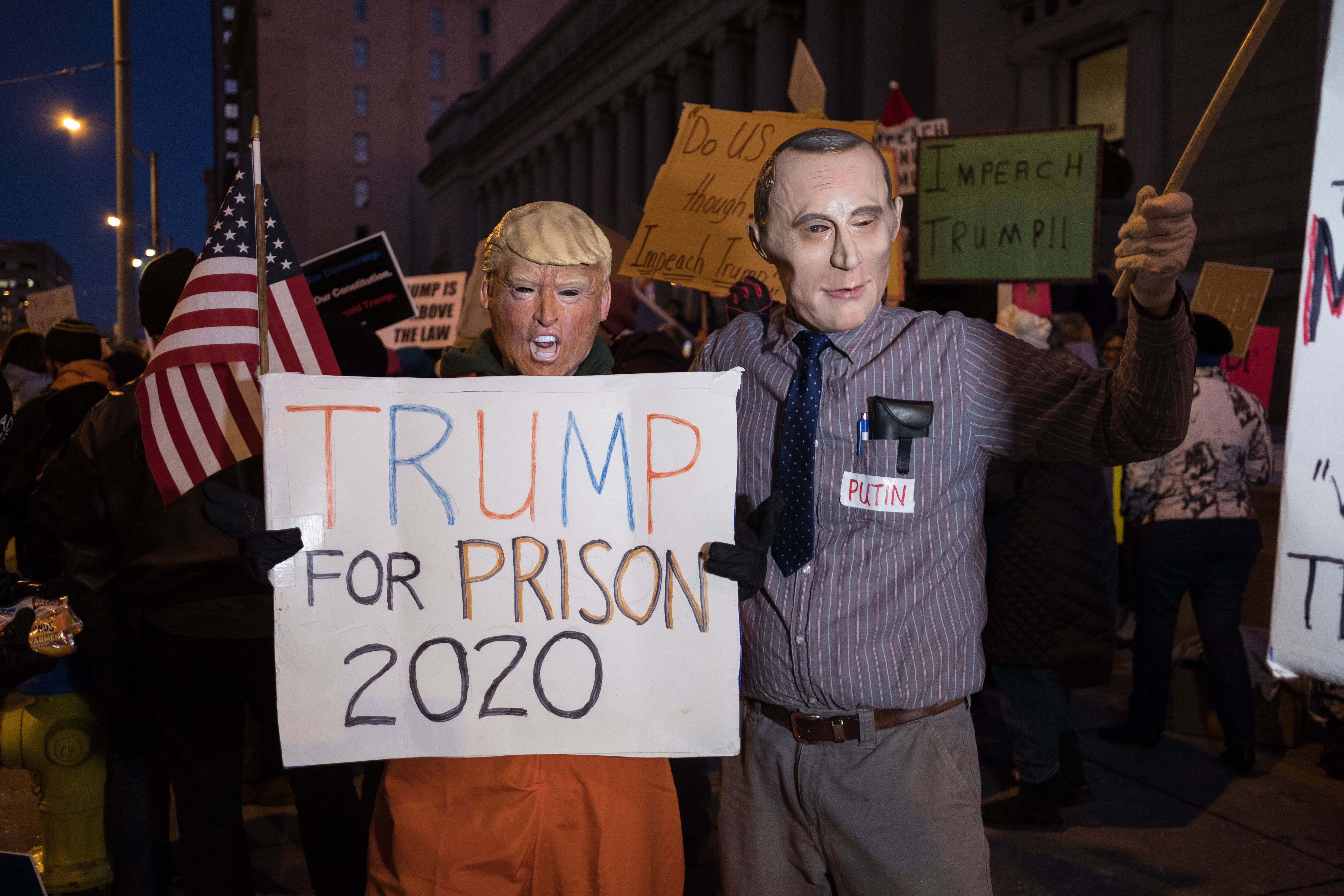 Protesters dressed as Trump and Putin take part during a Trump pro-impeachment rally in Dayton.
