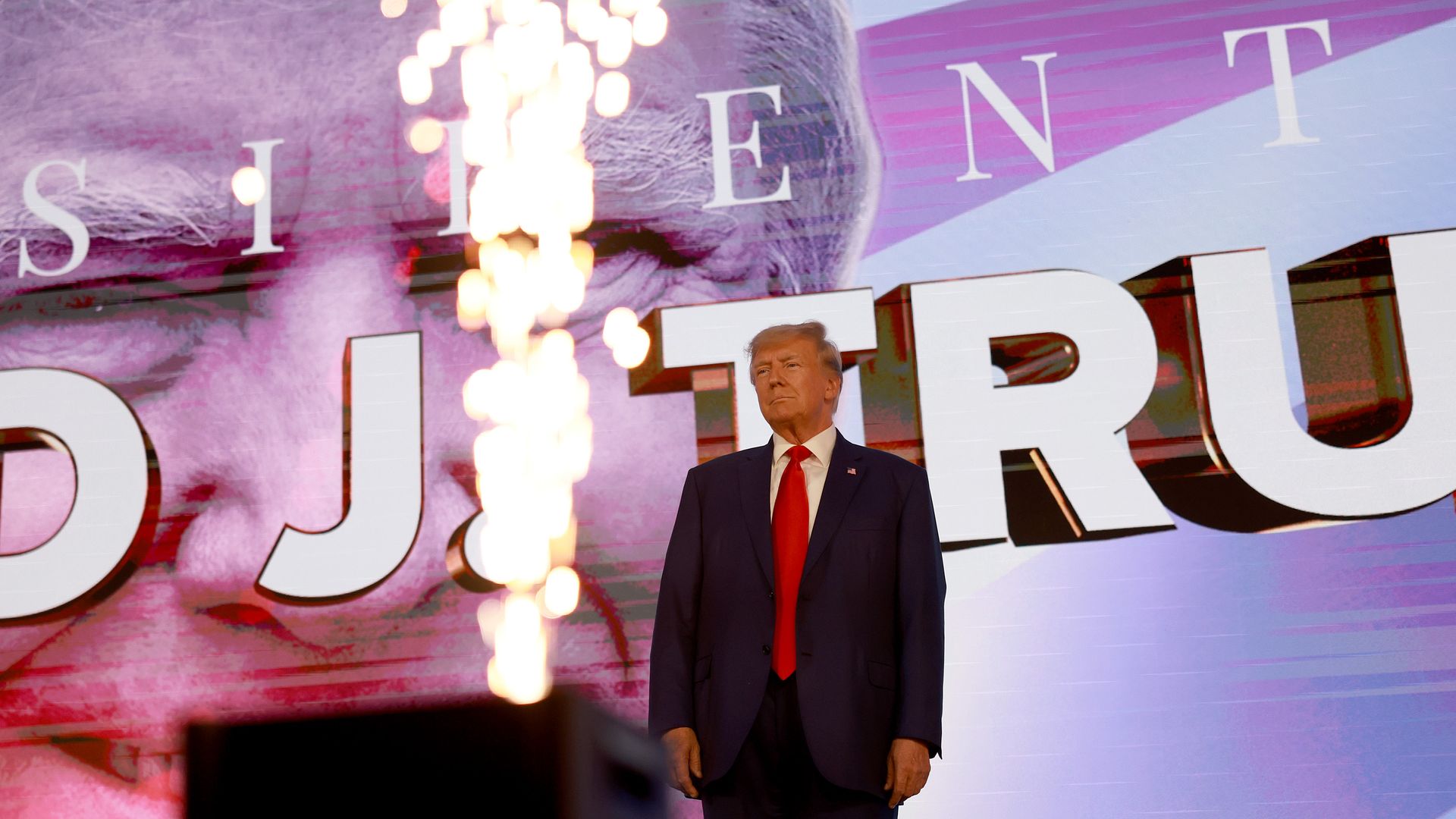 Former US President Donald Trump arrives on stage at the Turning Point Action conference as he continues his 2024 presidential campaign on July 15, 2023 in West Palm Beach, Florida