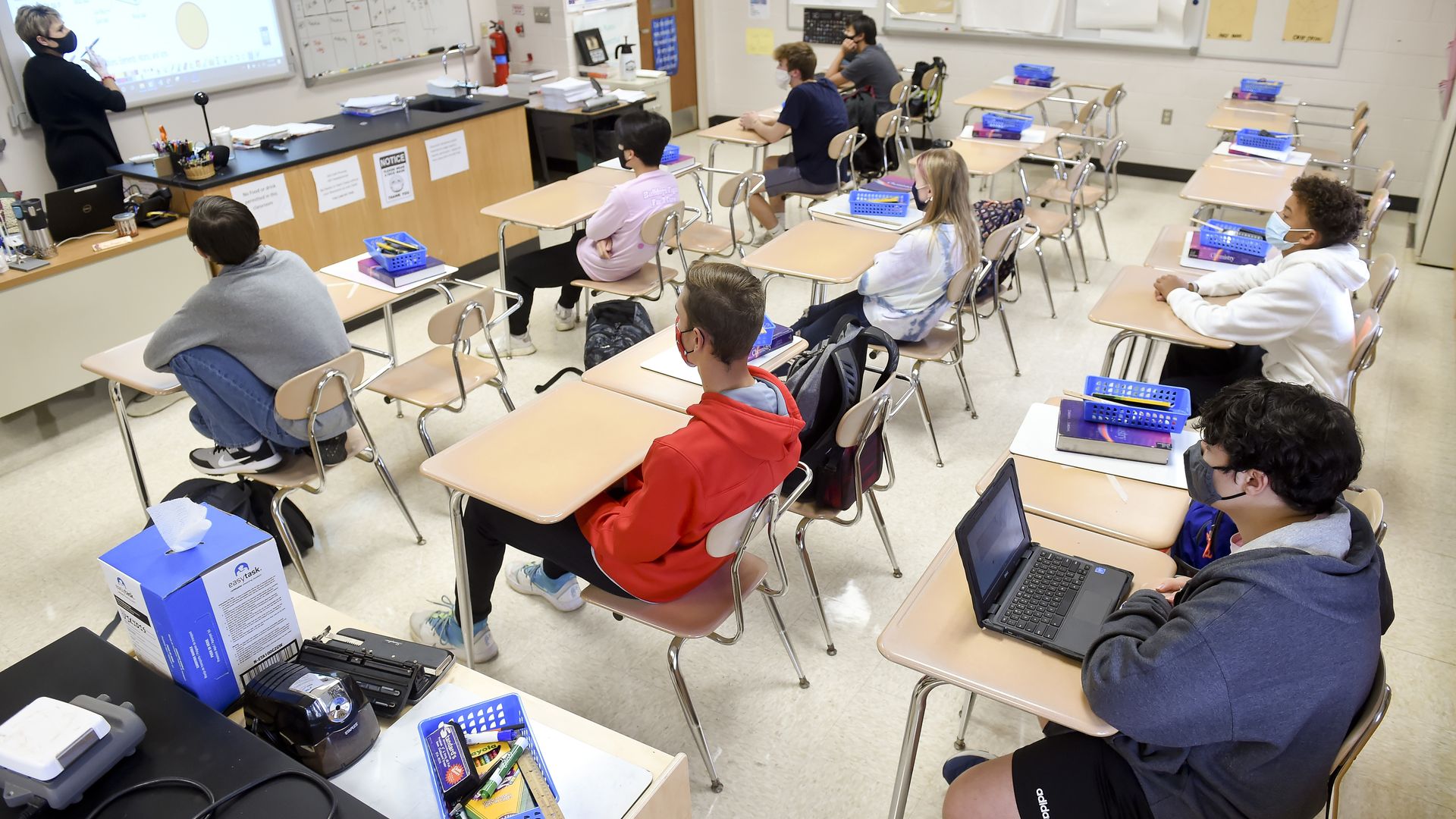 Students in Robin Timpson's honors chemistry class where the desks in the classroom are doubled to provide extra spacing.
