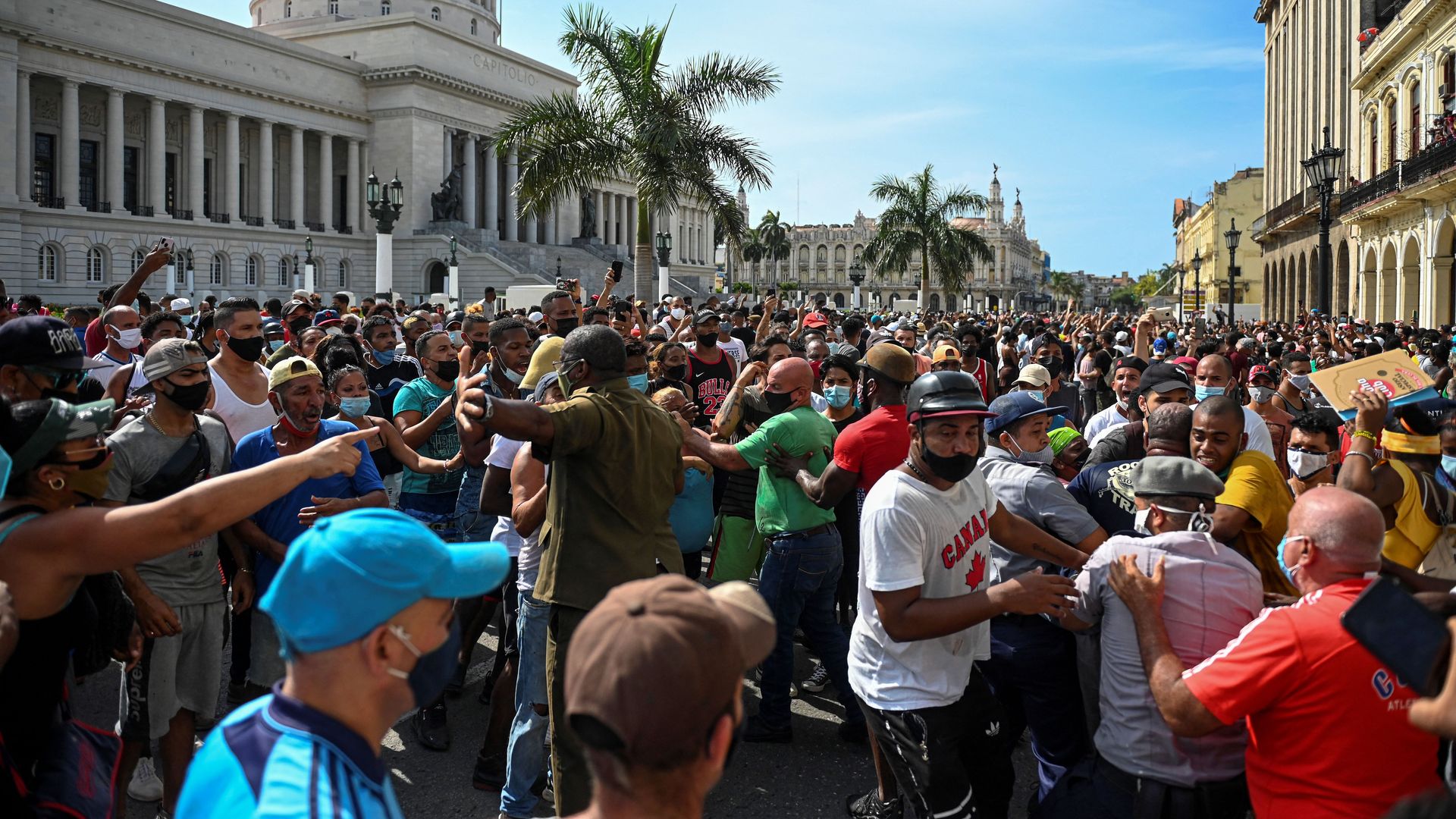  People take part in a demonstration against the government of Cuban President Miguel Diaz-Canel in Havana, on July 11