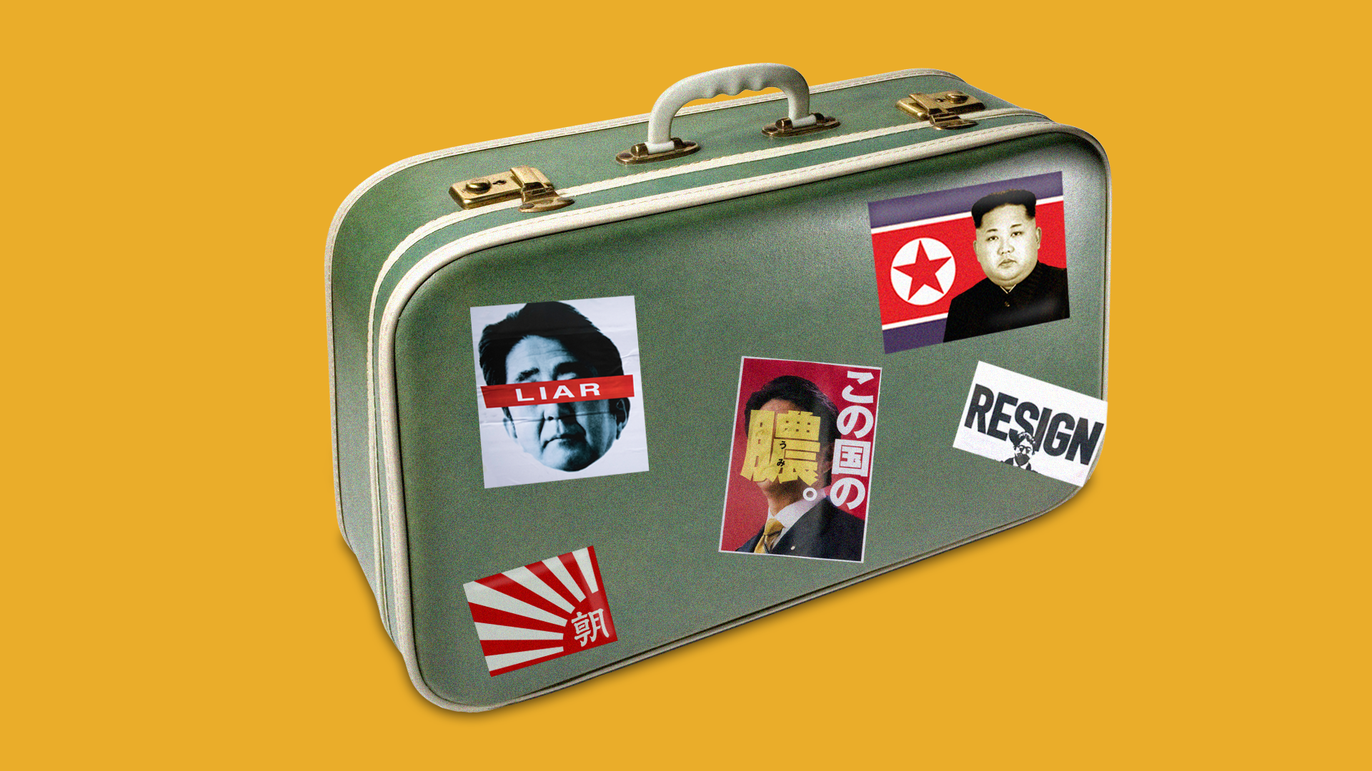 Baggage with vandalized photos of Japanese prime minister