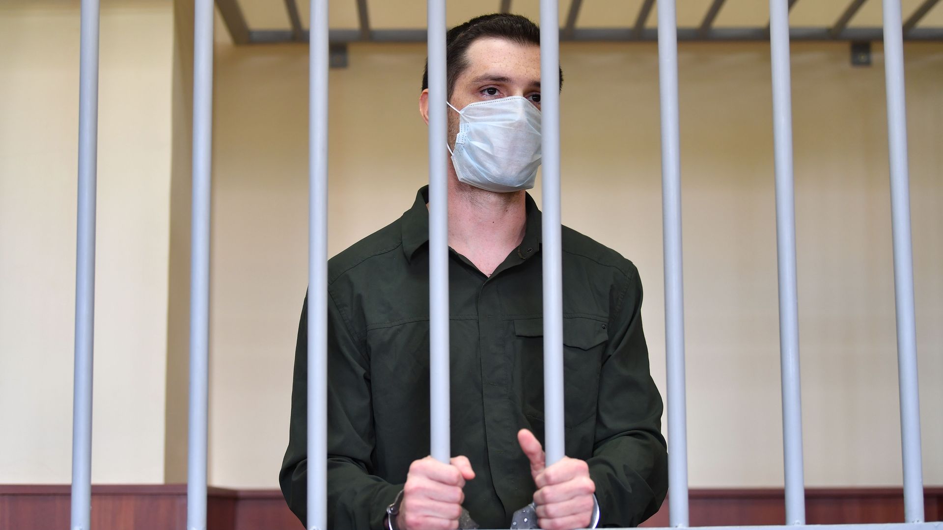Former U.S. Marine Trevor Reed in a defendants' cage in a Moscow court in July 2020.