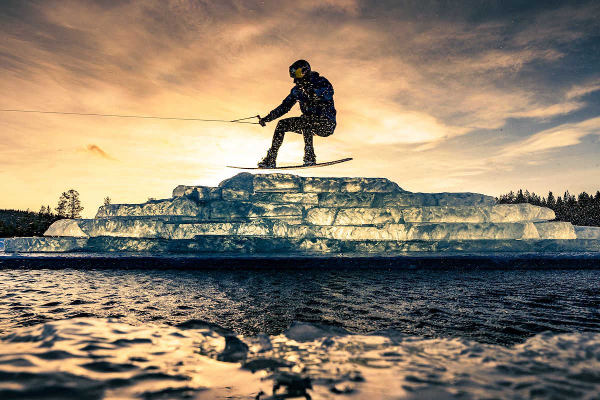wakeboard jump with sunset in background