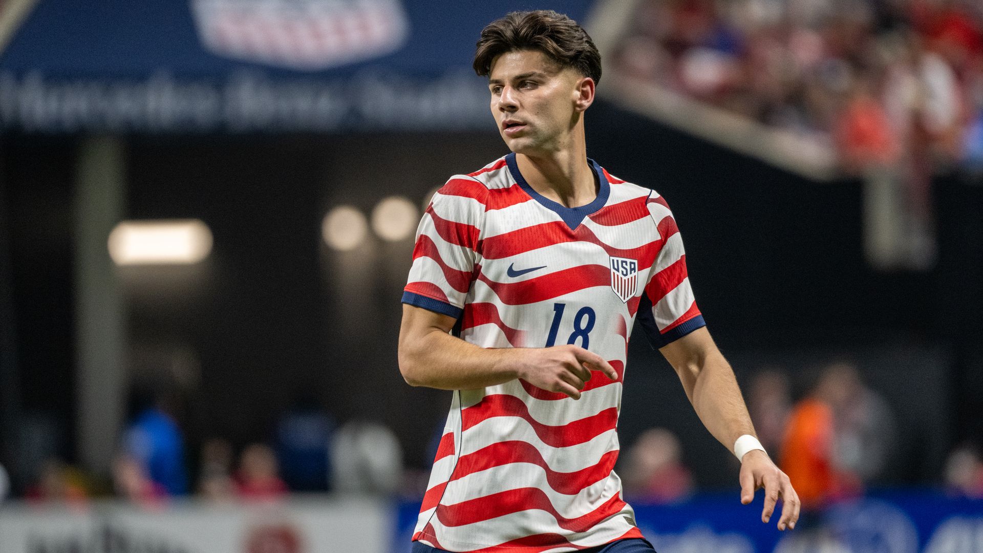 Max Arfsten wears his No. 18 United States jersey