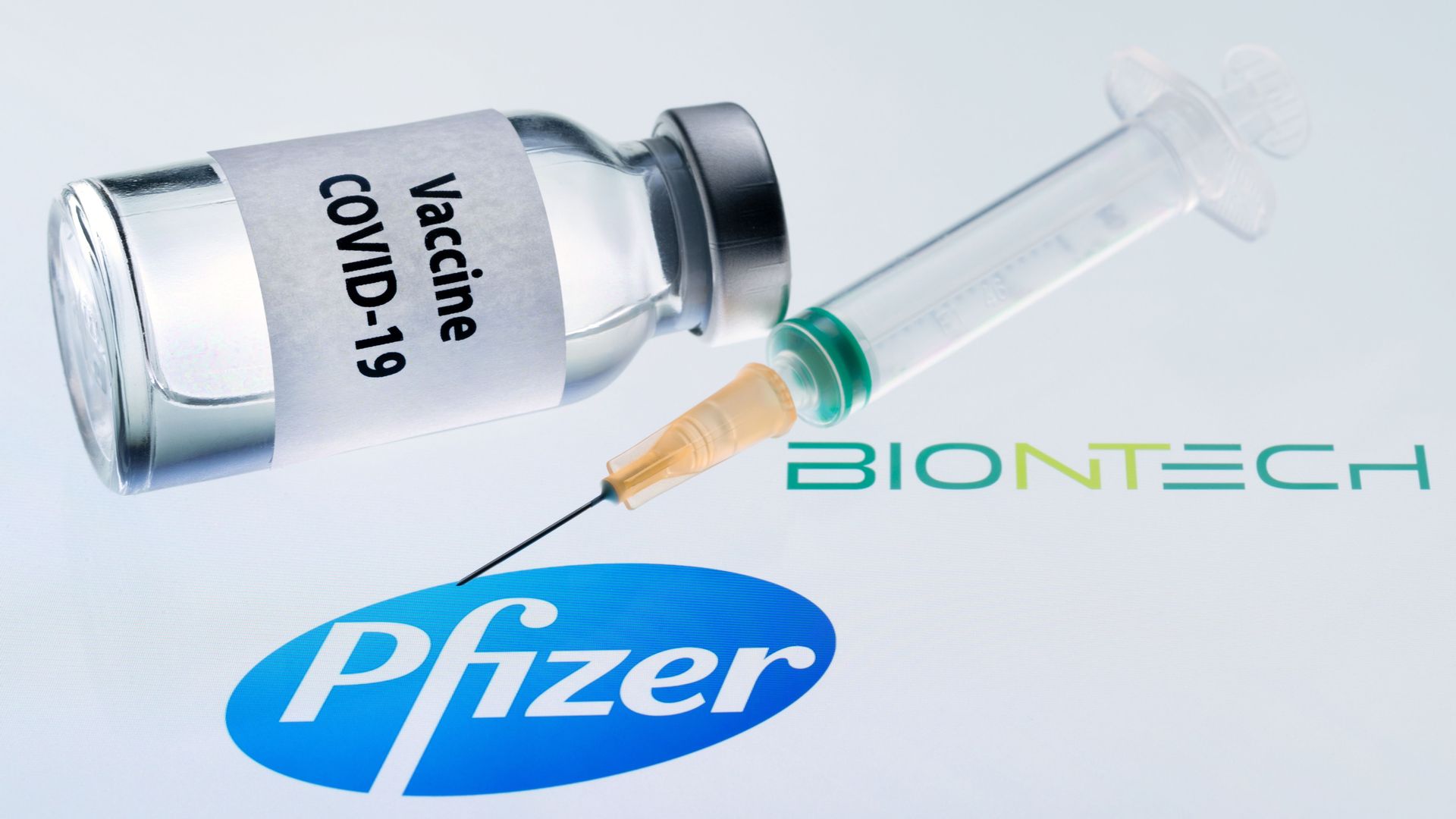 the Vaccine in a syringe and bottle