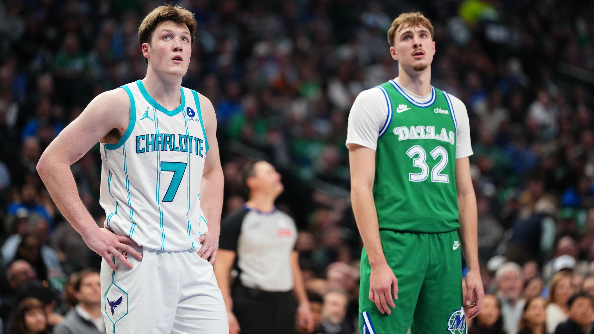 Kon Knueppel #7 of the Charlotte Hornets and Cooper Flagg #32 of the Dallas Mavericks waits for the rebound on January 29, 2026 at American Airlines Center in Dallas, Texas.