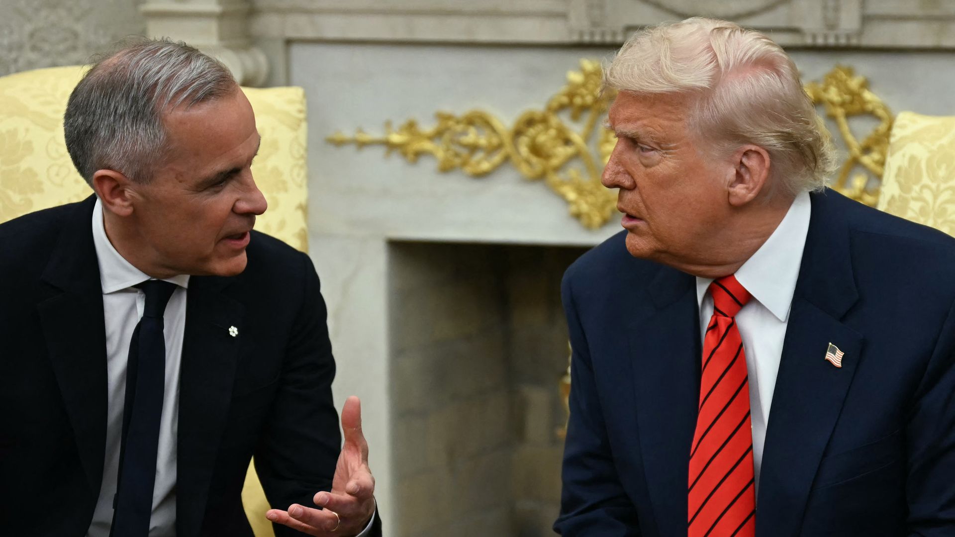 Canadian Prime Minister Mark Carney speaks with President Trumpin the Oval Office of the White House in Washington, DC, on May 6, 2025. 