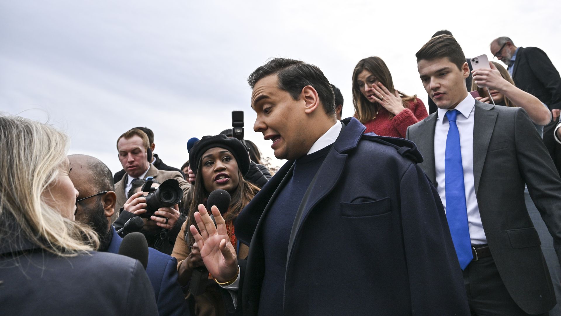 Former Rep. George Santos (R-N.Y.) is swarmed by media while leaving the U.S. Capitol after being expelled from The House of Representatives on December 1, 2023 in Washington, D.C.