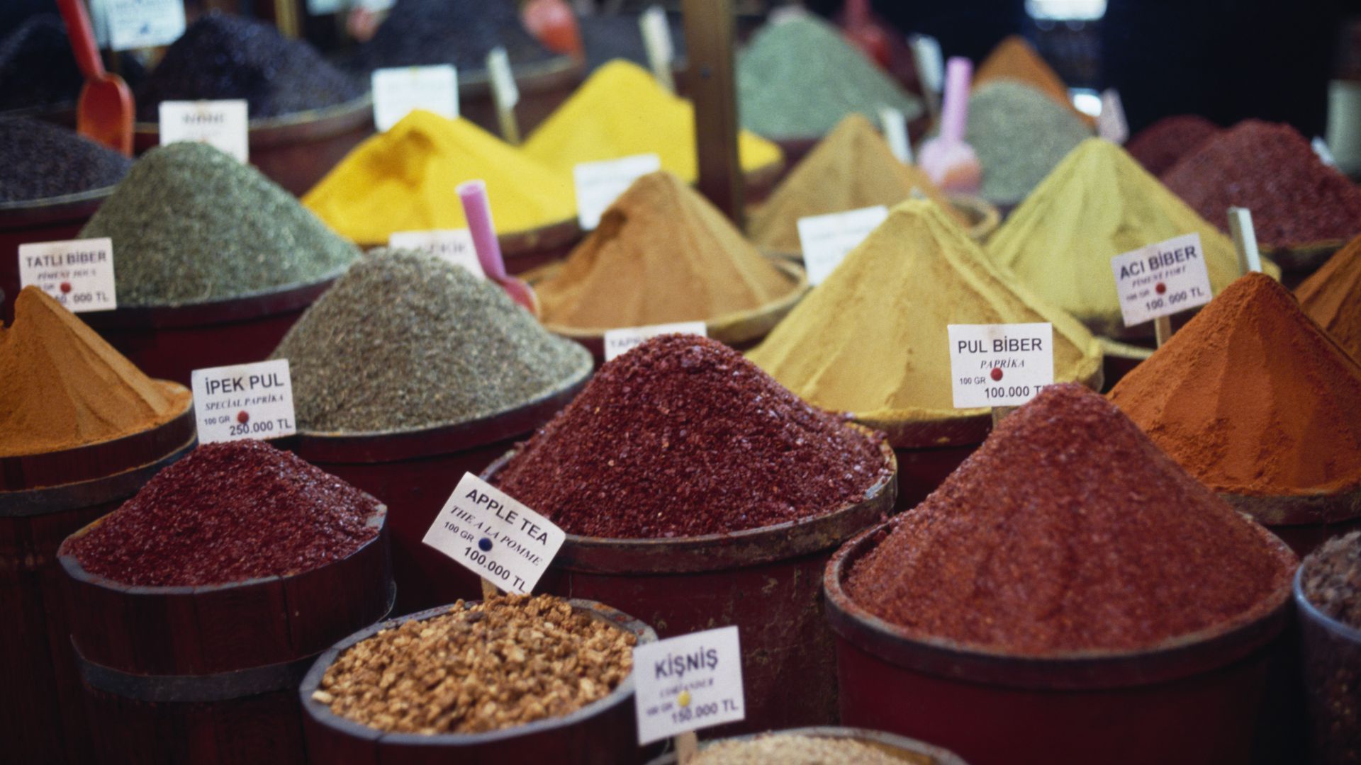 An array of spices on sale at a market