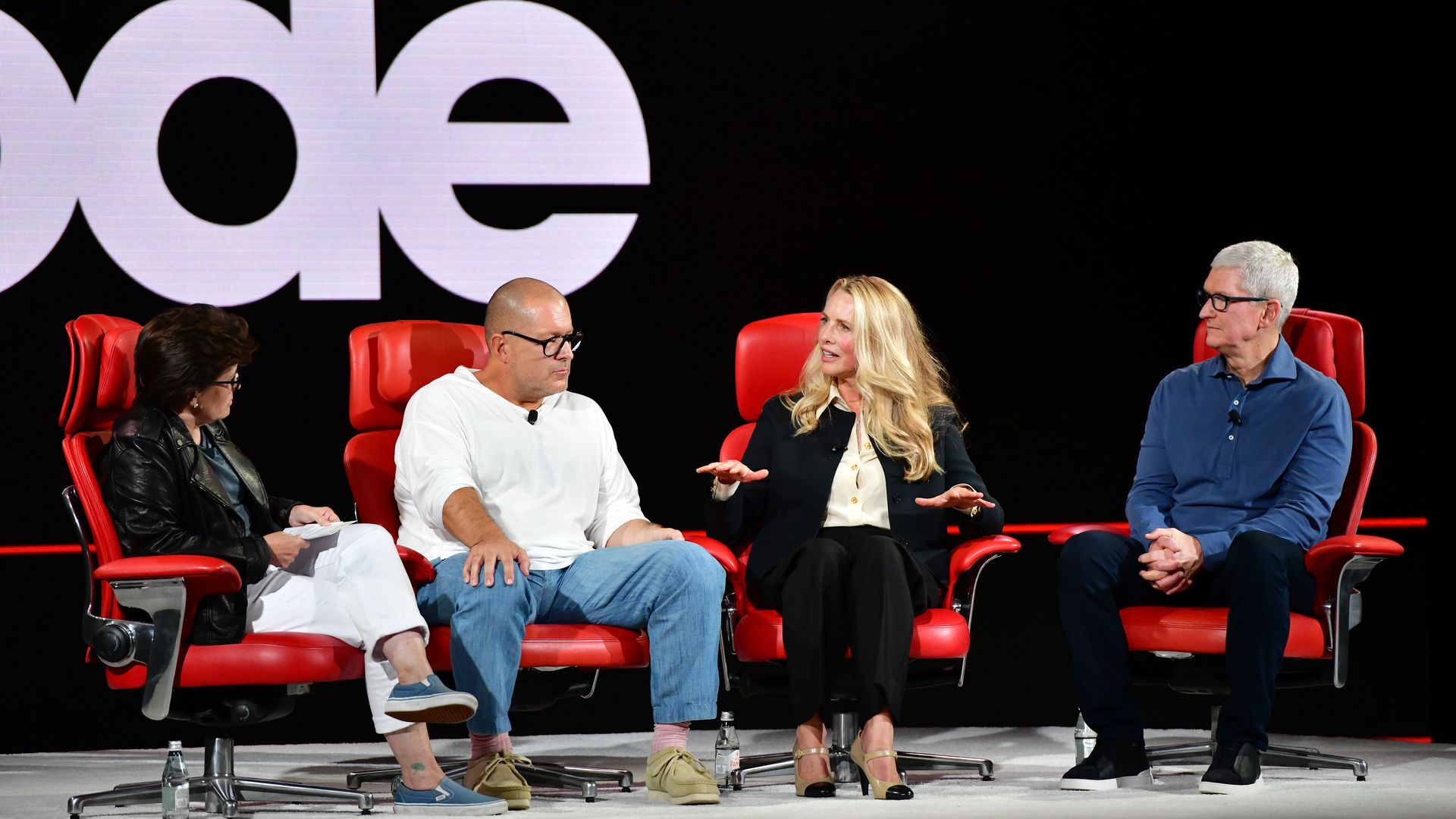 Kara Swisher, Jony Ive, Laurene Powell Jobs, and Apple CEO Tim Cook speak onstage during Code Conference