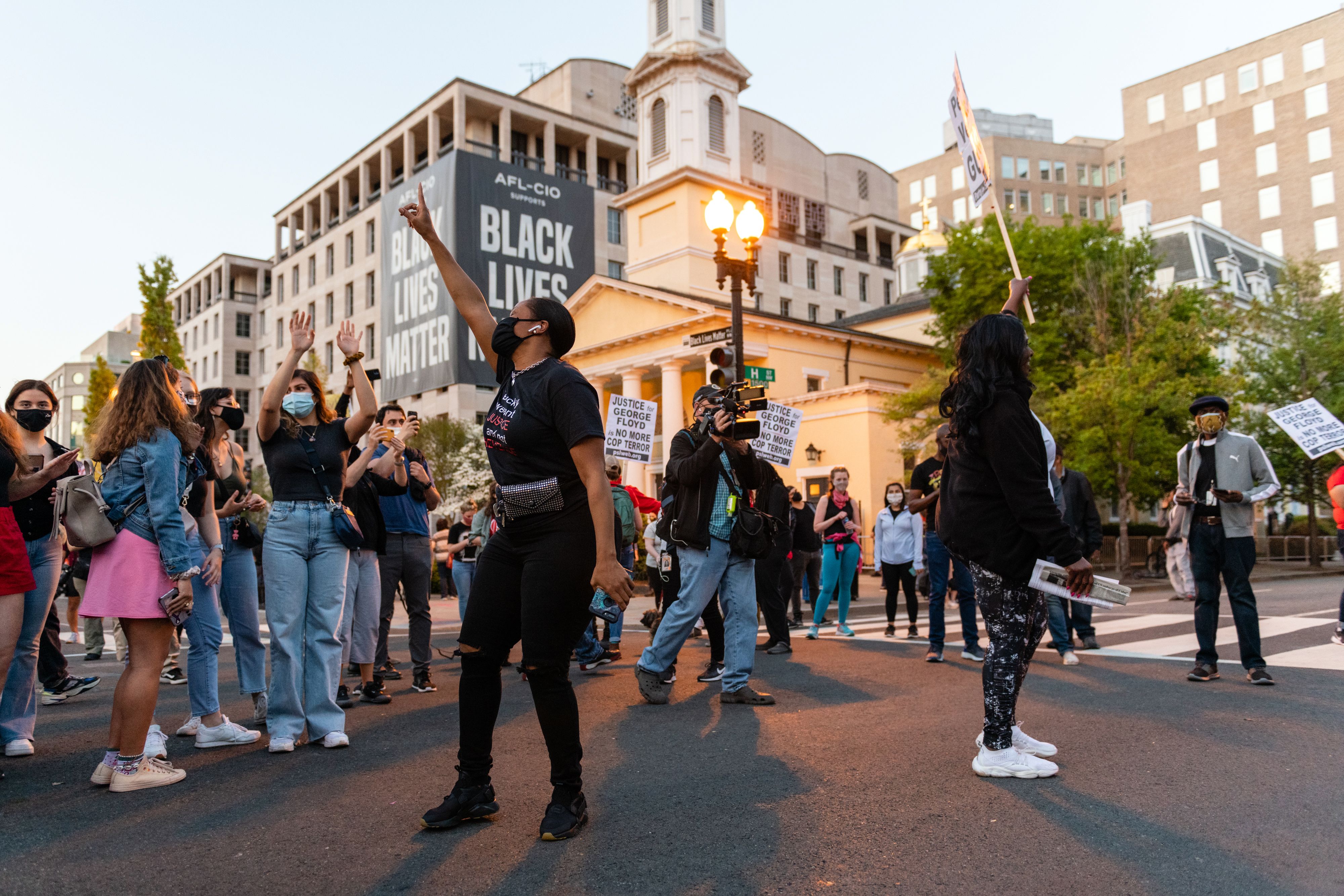 People celebrate after the verdict is announced in the trial of former Minneapolis police officer Derek Chauvin at Black Lives Matter Plaza in Washington, D.C.