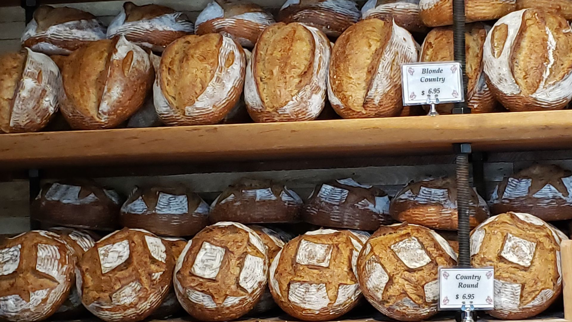 Artisan bread loaves on a shelf