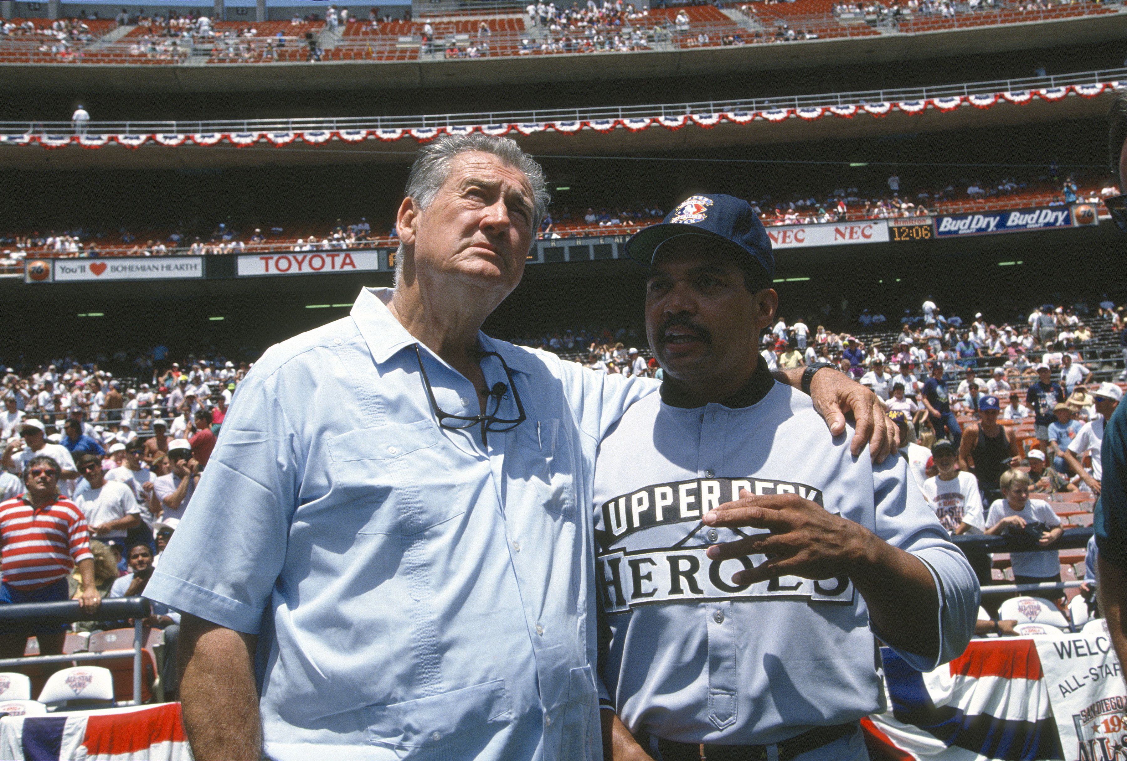 Baseball Hall of Famers Ted Williams (L) and Reggie Jackson (R) stand together prior to Major League baseball All Star Game circa 1992 at Jack Murphy Stadium in San Diego, California. 