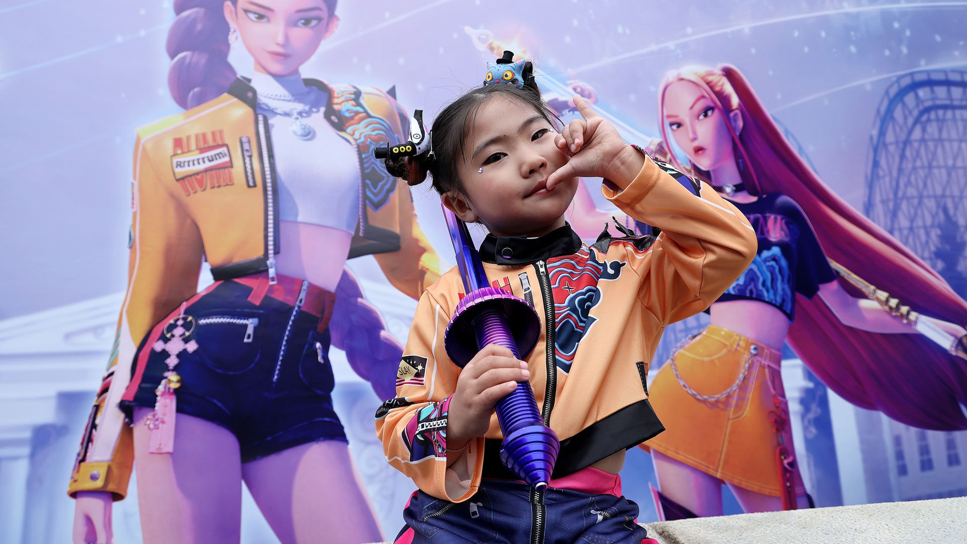YONGIN, SOUTH KOREA - SEPTEMBER 30: A model wearing a costume based on the charecter Rumi poses for photographs at the KPop Demon Hunters themed zone at Everland on September 30, 2025 in Yongin, South Korea. The park opened a new themed zone on 26 September, in collaboration with Netflix, which feat