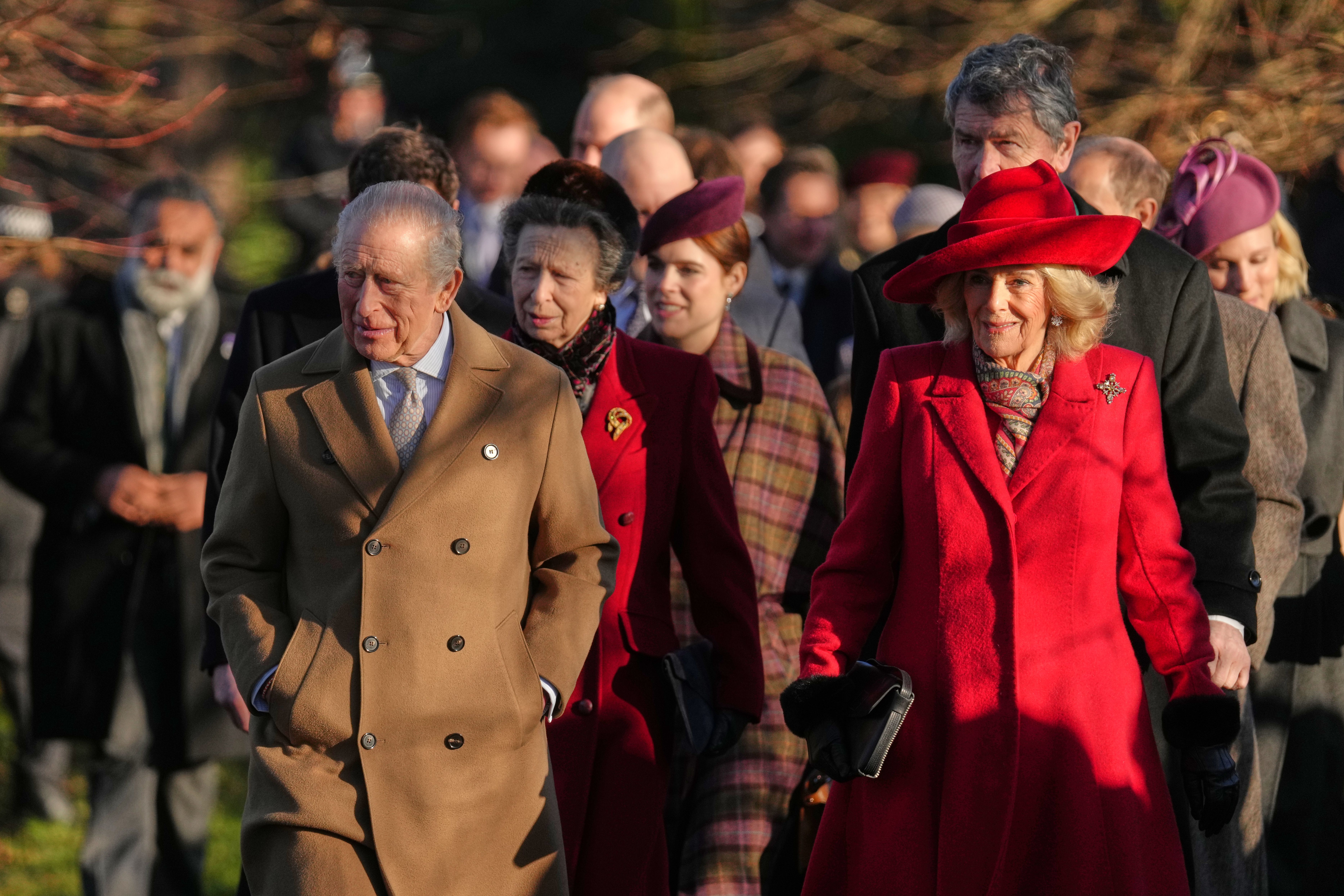 King Charles III and Queen Camilla arrive to attend the Christmas Day service at St Mary Magdalene Church in Sandringham, England.
