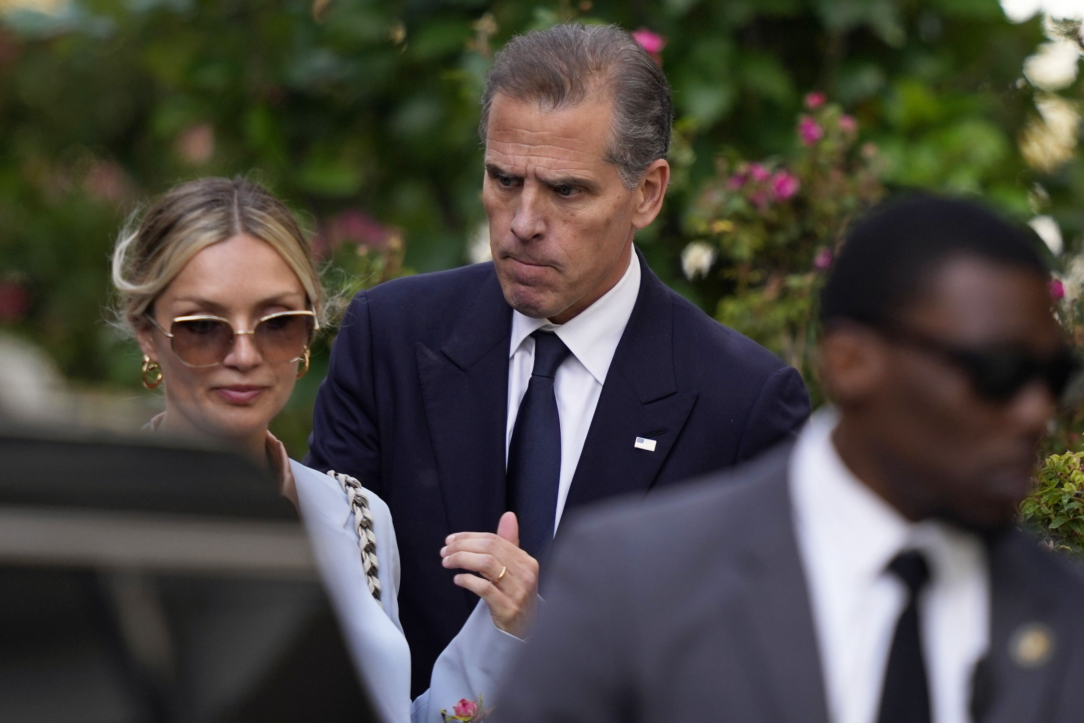 Hunter Biden, accompanied by his wife Melissa Cohen Biden, departs federal court in Wilmington, Del., yesterday.