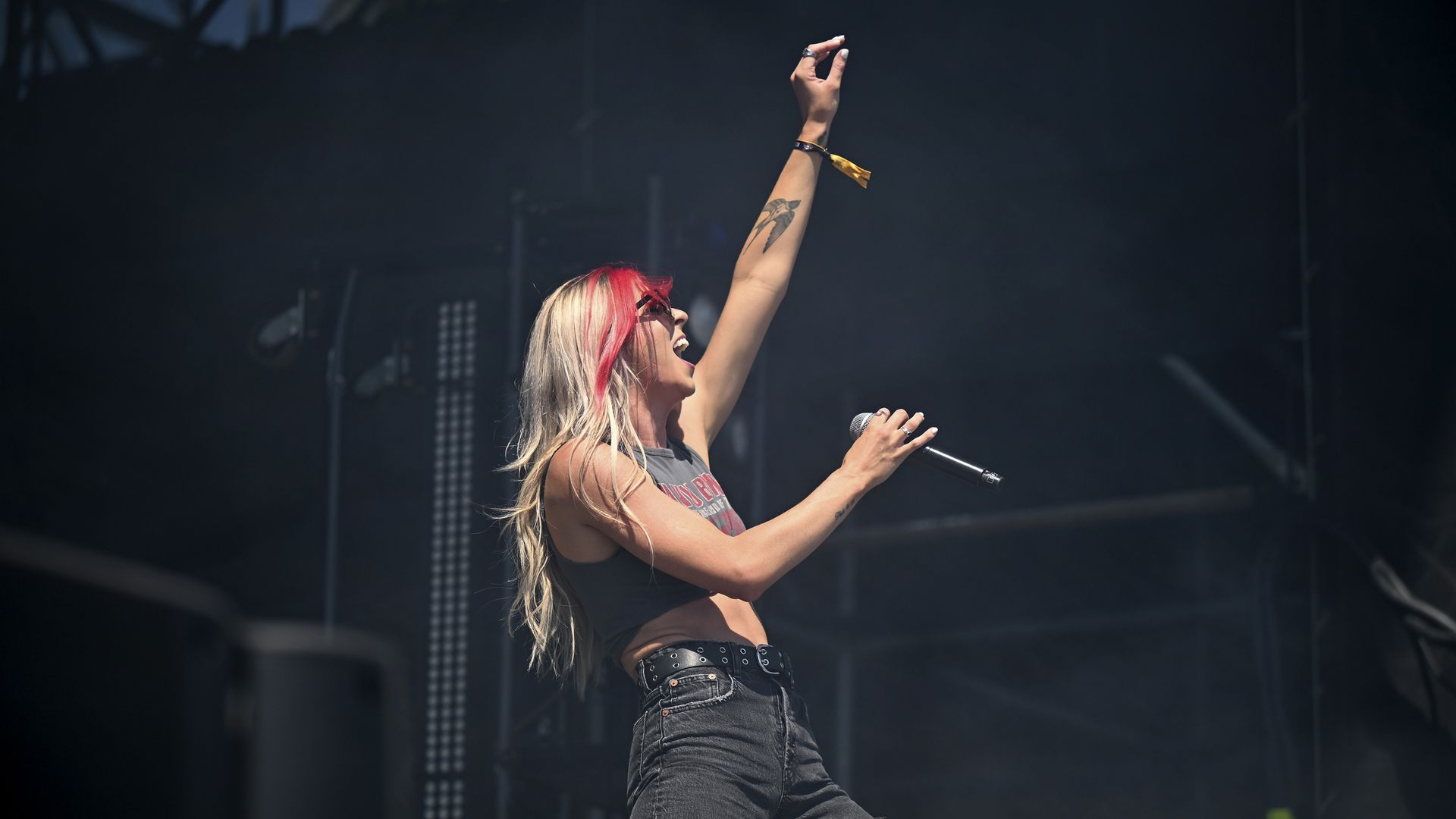 Singer Taylor Acorn performs on stage. 