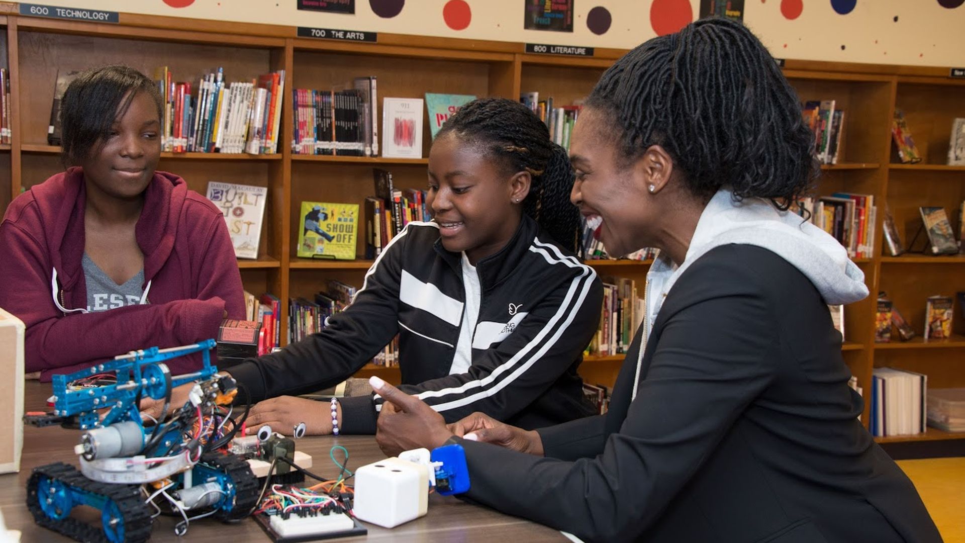 A volunteer from Salesforce at a middle school in San Francisco.