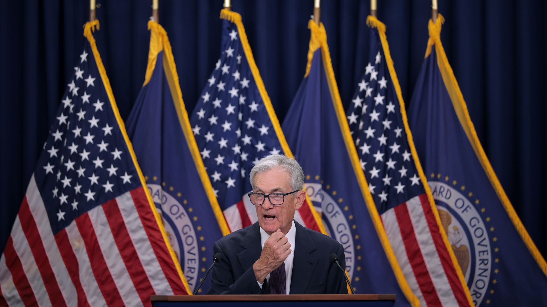 Fed chair Jerome Powell speaks at a podium at a news conference following a two-day meeting of the Federal Open Market Committee at the Federal Reserve  last month