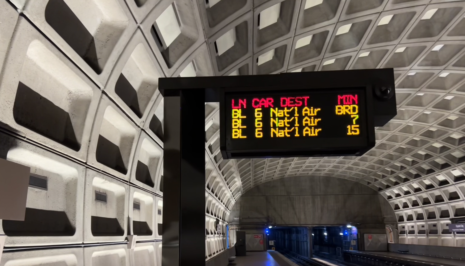 A digital Metro sign showing wait times for the Blue line.