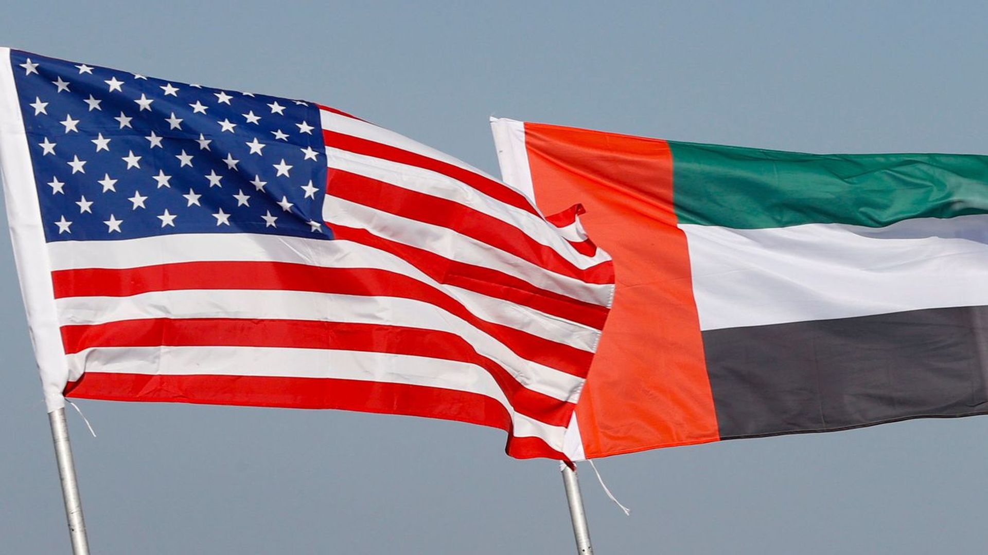 American and Emirati flags. 