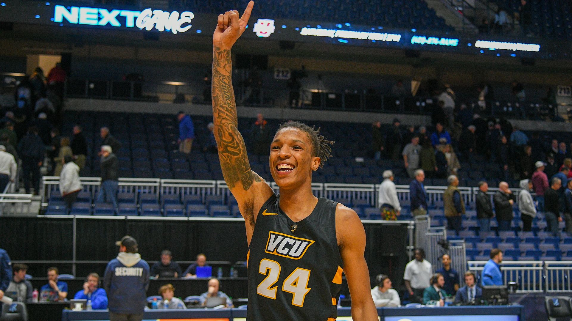 VCU Rams guard Nick Kern Jr. (24) celebrates on the court following a college basketball game between the VCU Rams and the Rhode Island Rams on February 15, 202