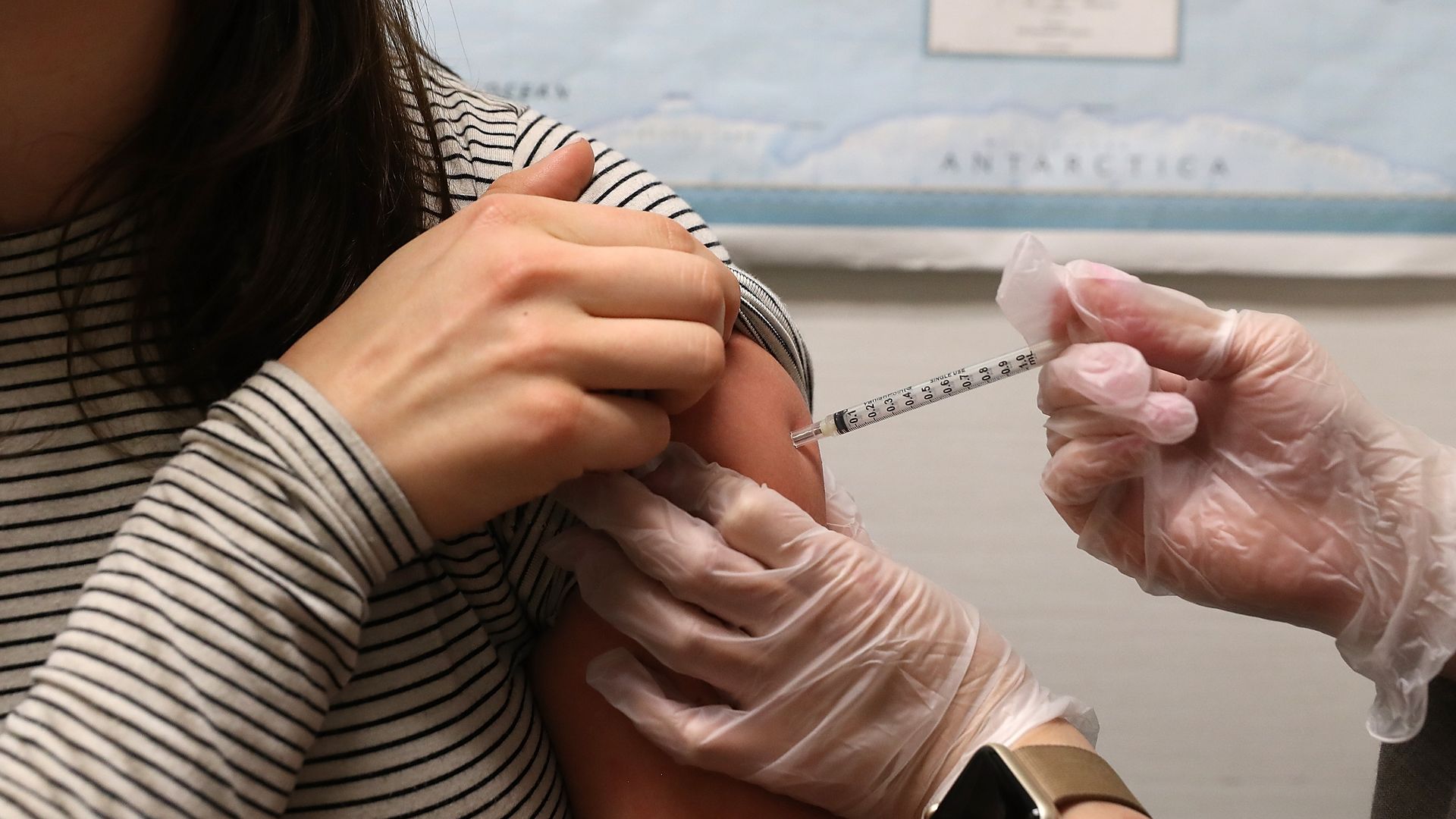 Woman getting flu shot