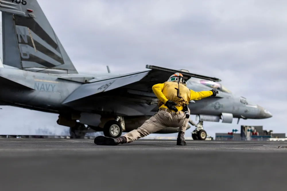 An F/A-18E Super Hornet, assigned to Strike Fighter Squadron (VFA) 151, launches from the flight deck of Nimitz-class aircraft carrier USS Abraham Lincoln (CVN 72), Aug. 12, 2026. Abraham Lincoln is deployed to the U.S. 5th Fleet area of operations to support maritime security and stability in the M