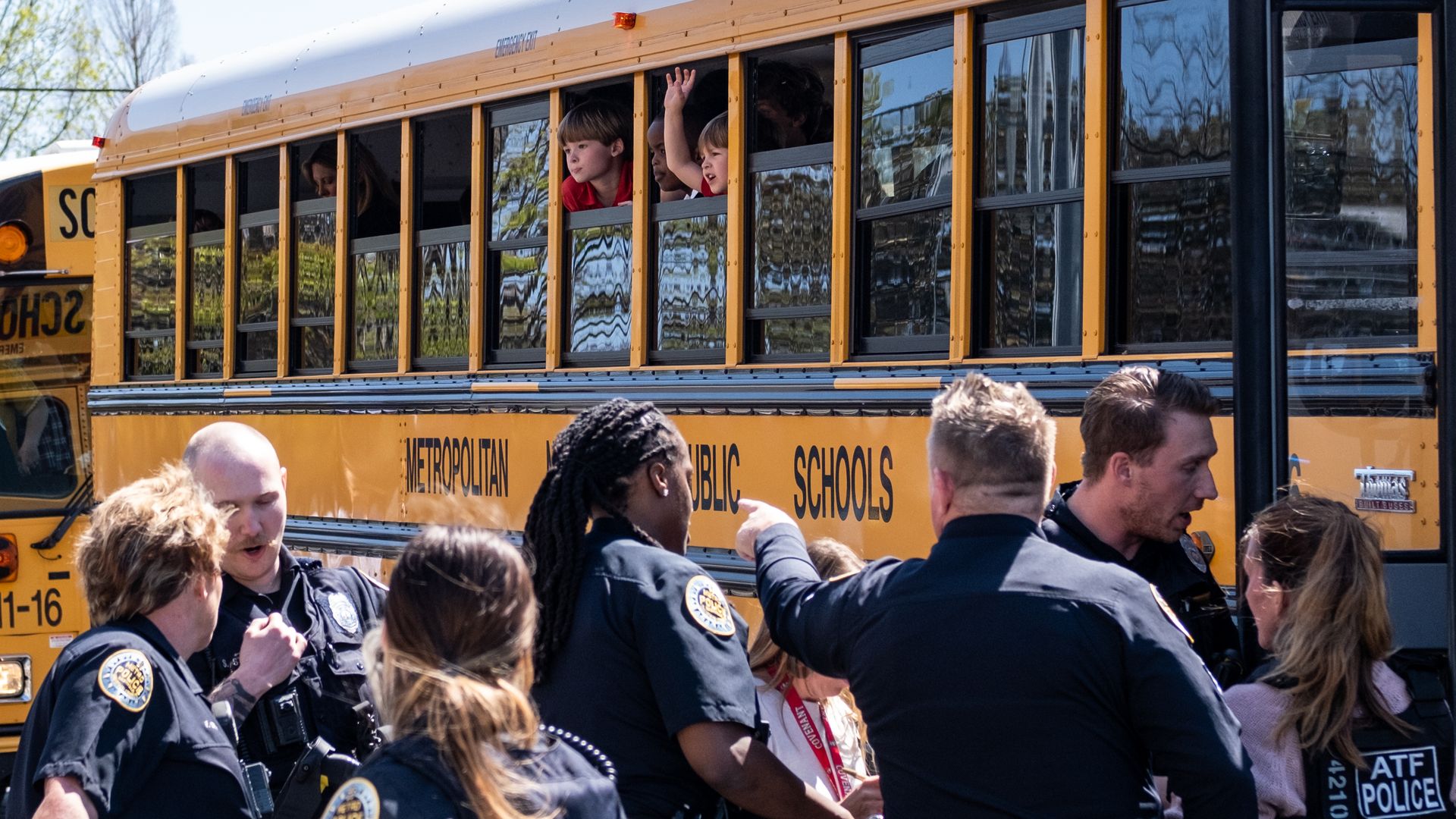 School bus with Children and Police