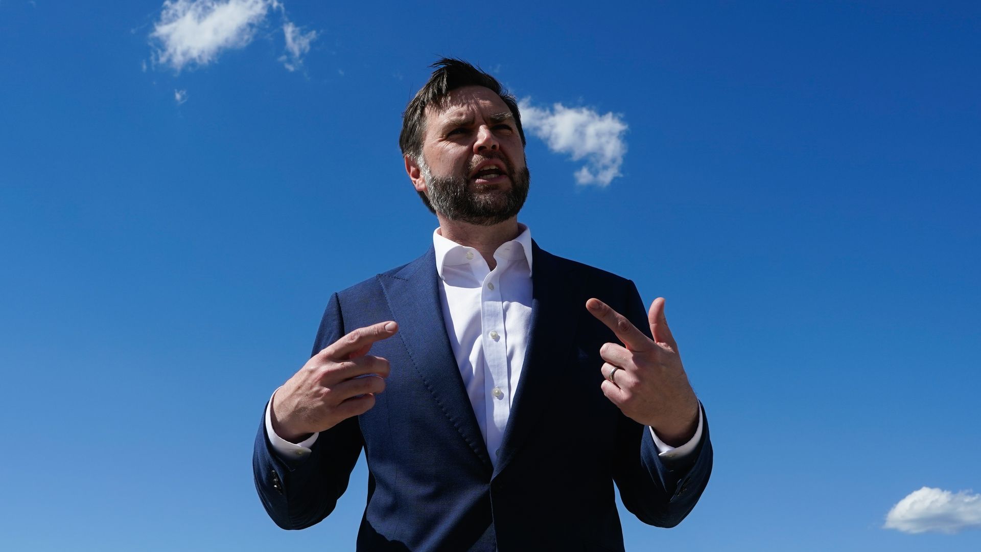 Vice President J.D. Vance speaks to reporters from Joint Base Andrews, in Maryland before hearing to Switzerland for negotiations with Iran.