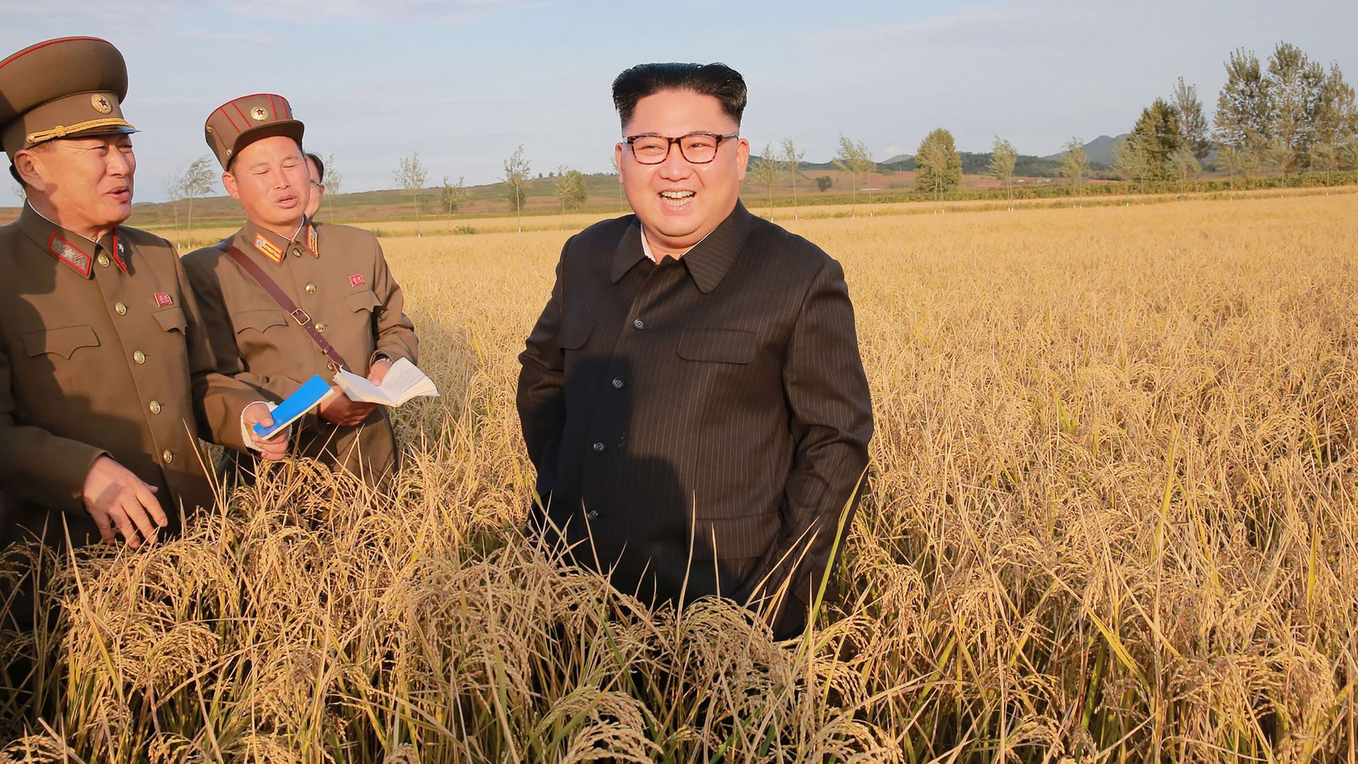 North Korean leader Kim Jong-Un (C) visiting Farm No. 1116 under Korean People's Army (KPA) Unit 810 at an undisclosed location