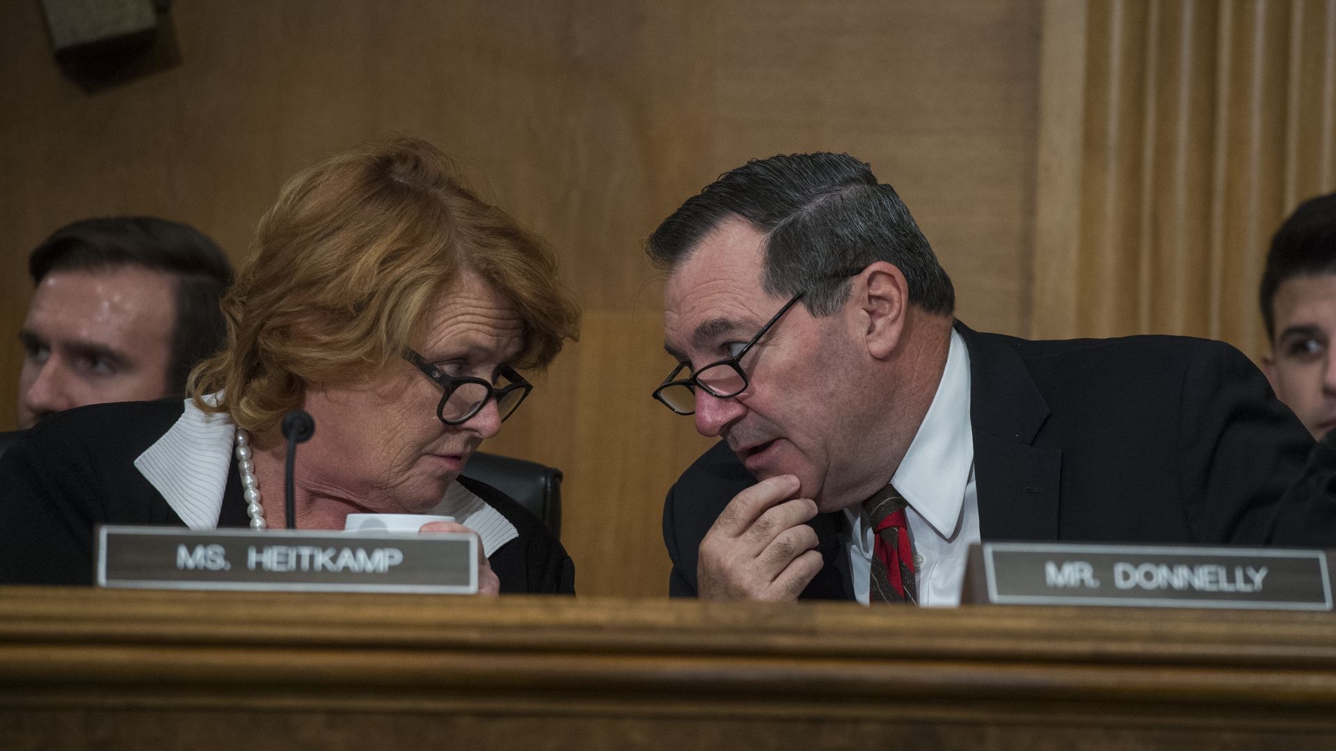 Heidi Heitkamp and Joe Donnelly talking