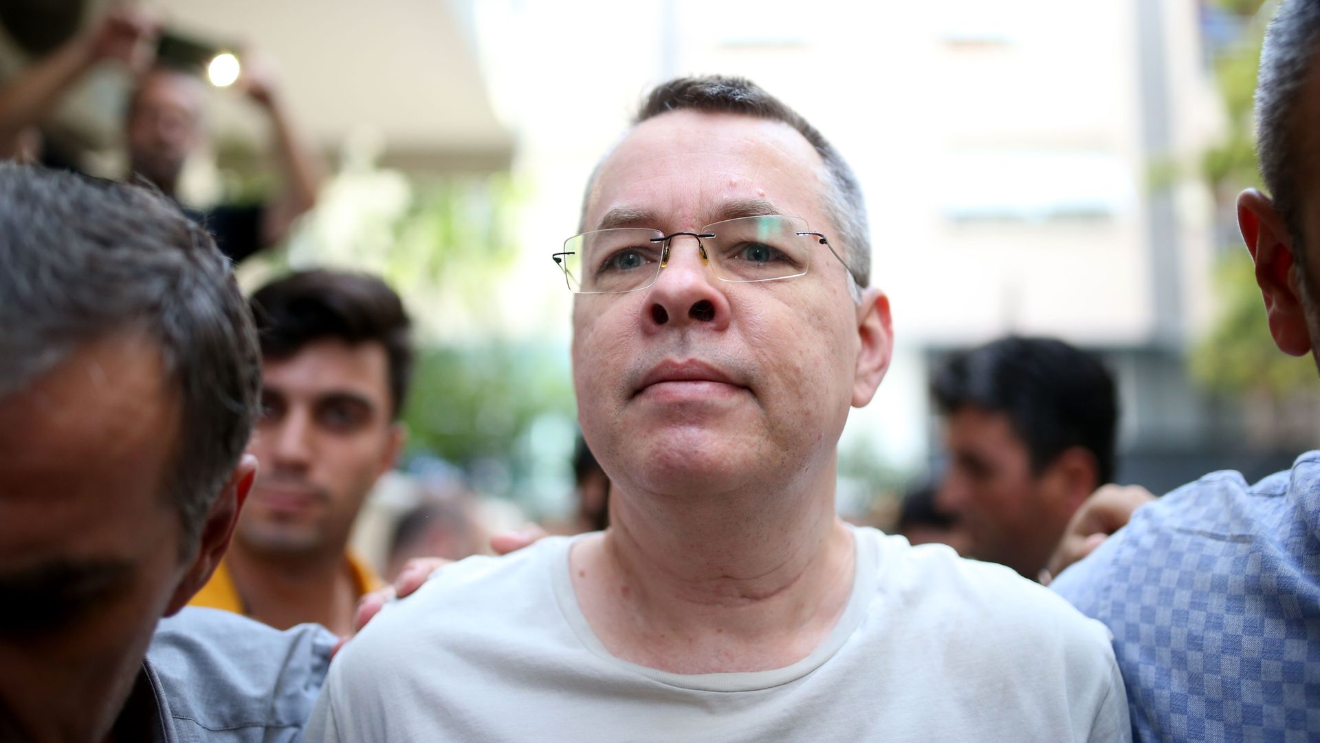 Pastor Andrew Craig Brunson being escorted by Turkish police officers. Photo: Stringer/AFP/Getty Images