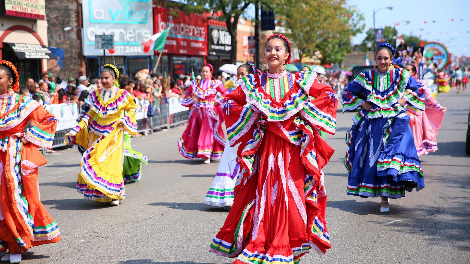 People participate in a parade ahead of the Mexican Independence day in Chicago, the United States on Sept. 10, 2017.