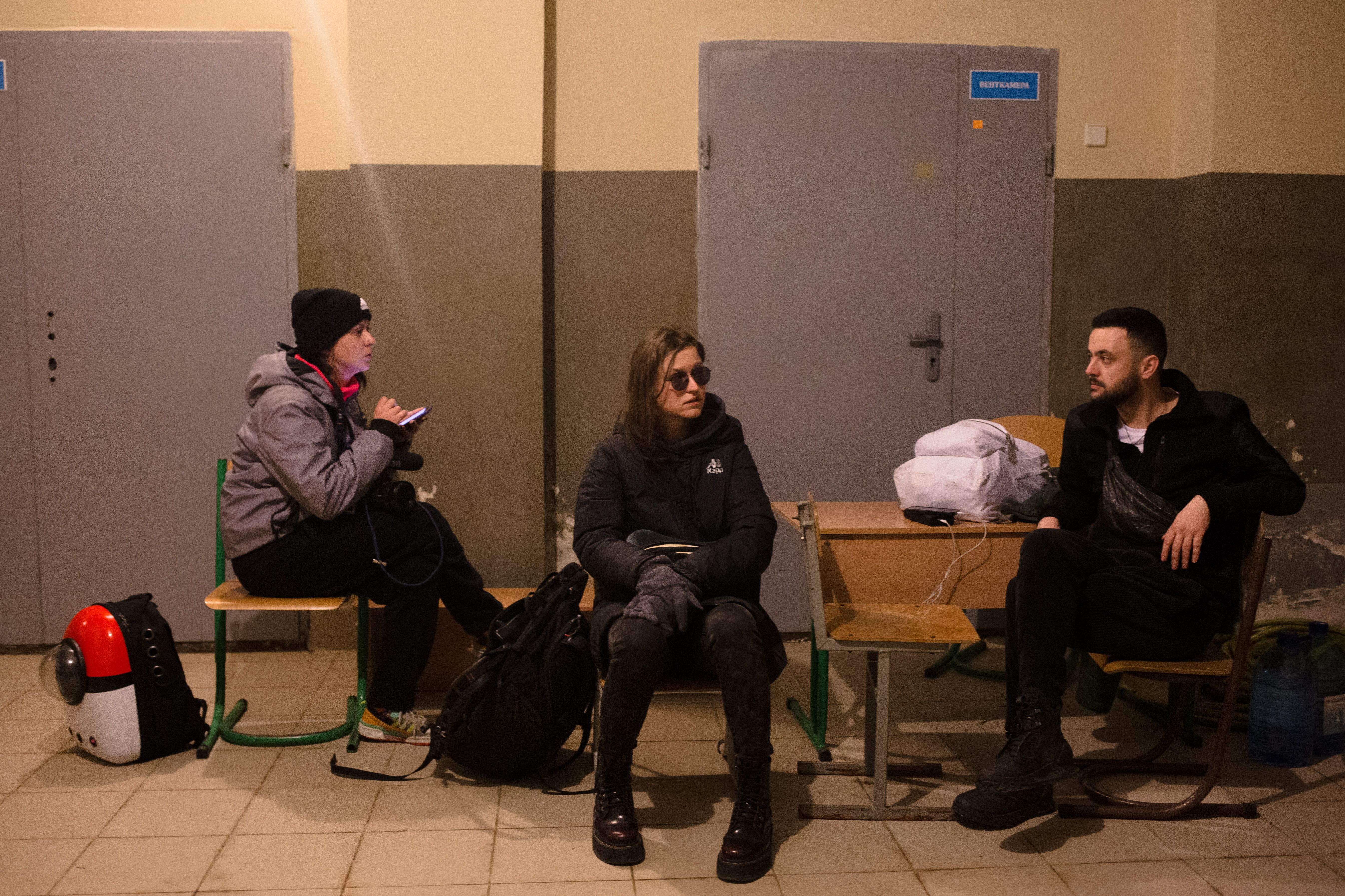 Kyiv residents wait for an air raid to end in a bomb shelter on Feb. 26. Photo: Anastasia Vlasova/Getty Images