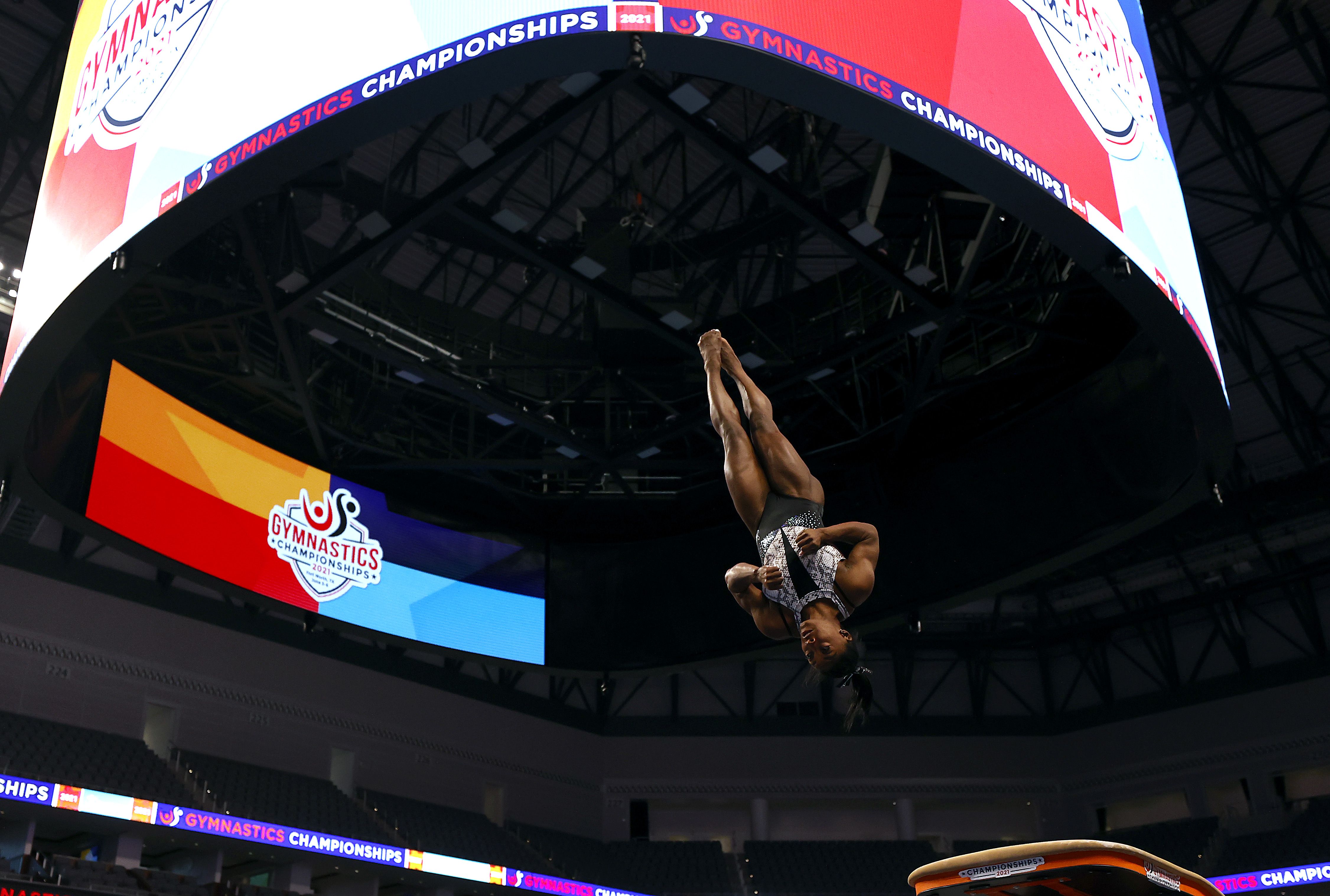  Simone Biles warms up on the vault prior to the Senior Women's competition of the U.S. Gymnastics Championships at Dickies Arena on June 06, 2021 in Fort Worth, Texas.