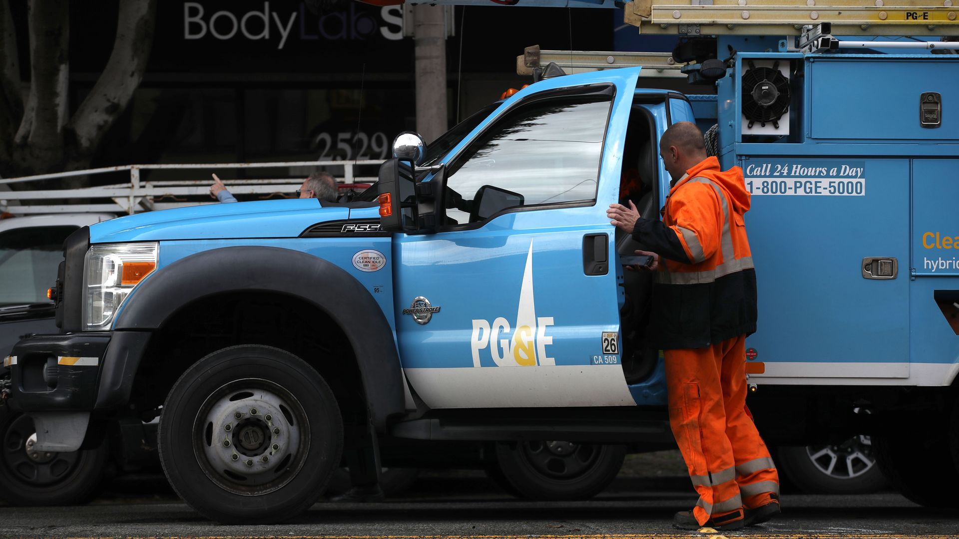 A worker getting into his PG&E truck