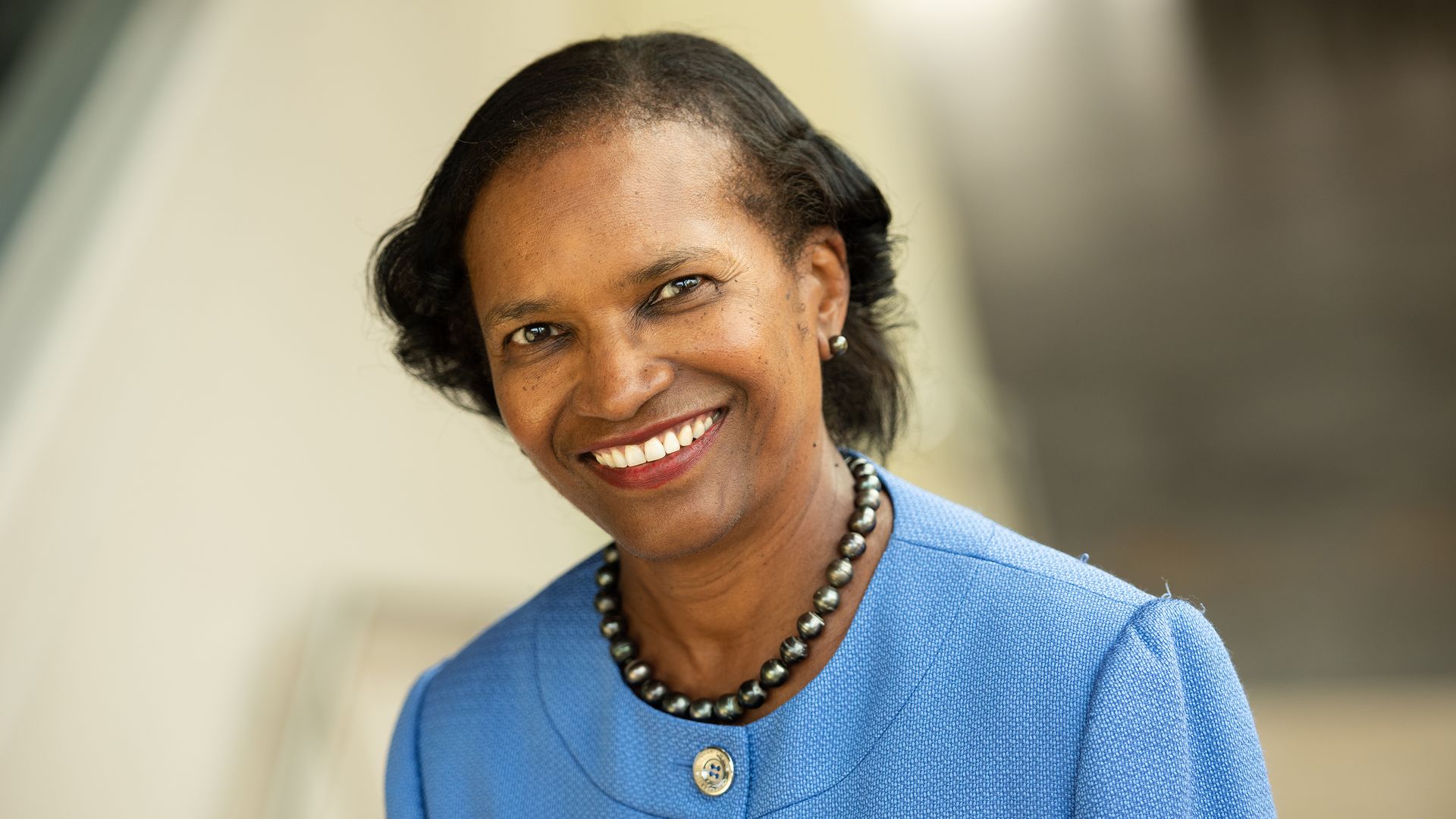 Photo of Brenda Mallory in a blue top smiling at the camera