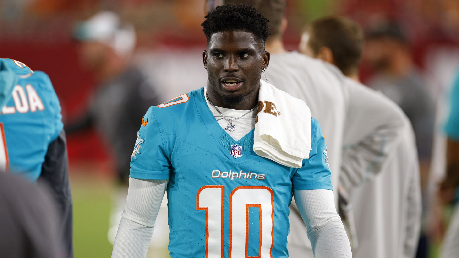  Tyreek Hill #10 of the Miami Dolphins looks on during a preseason game against the Tampa Bay Buccaneers at Raymond James Stadium on August 23, 2024 in Tampa, Florida. 