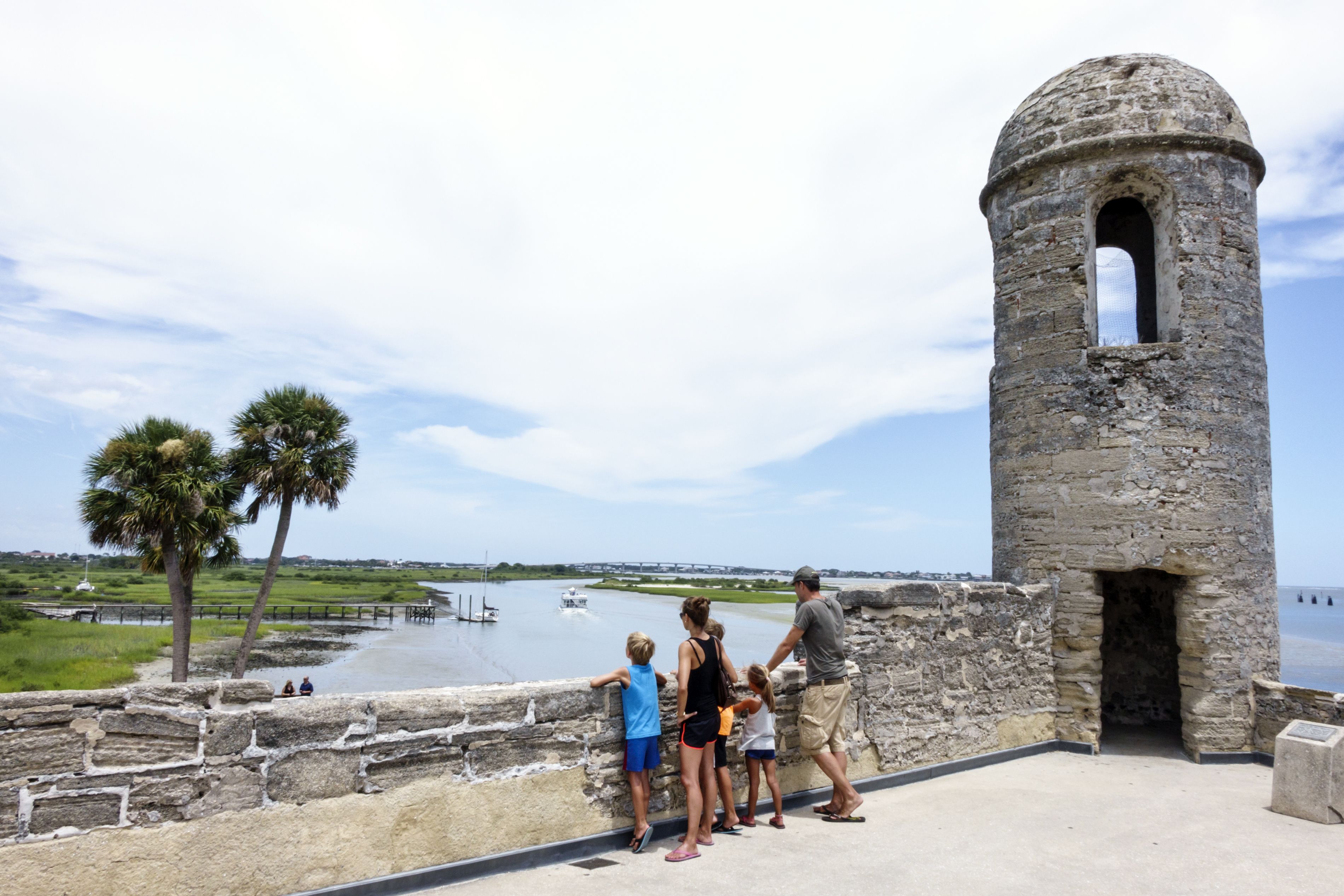 A family at the sentry post at the Castillo de San Marcos National Monument in Florida.