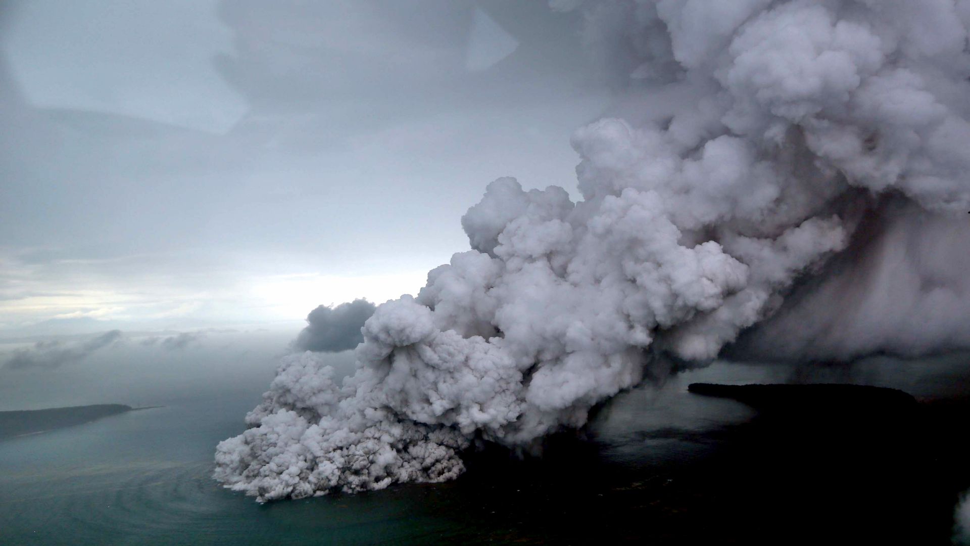 Smoke billowing from volcano eruption