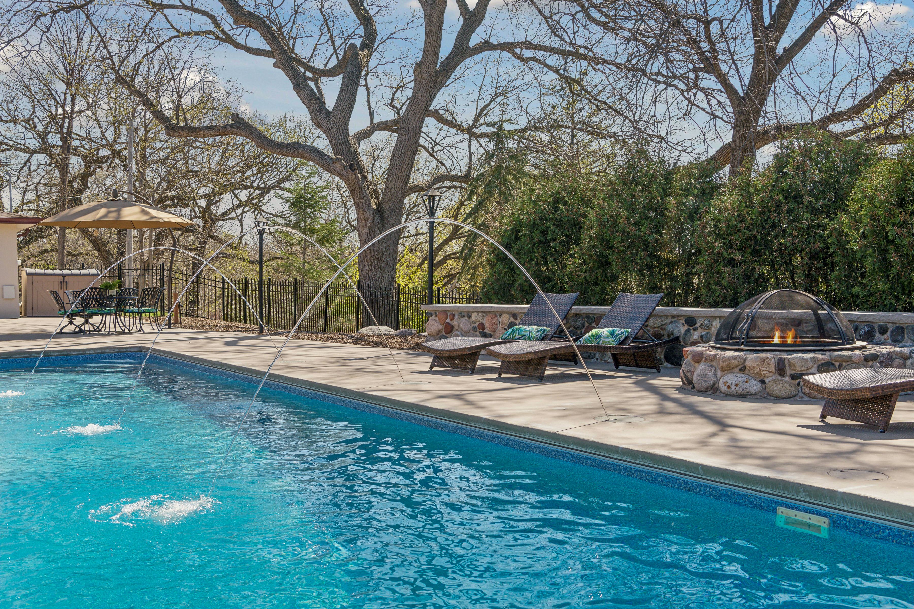 A pool with jets shooting water.