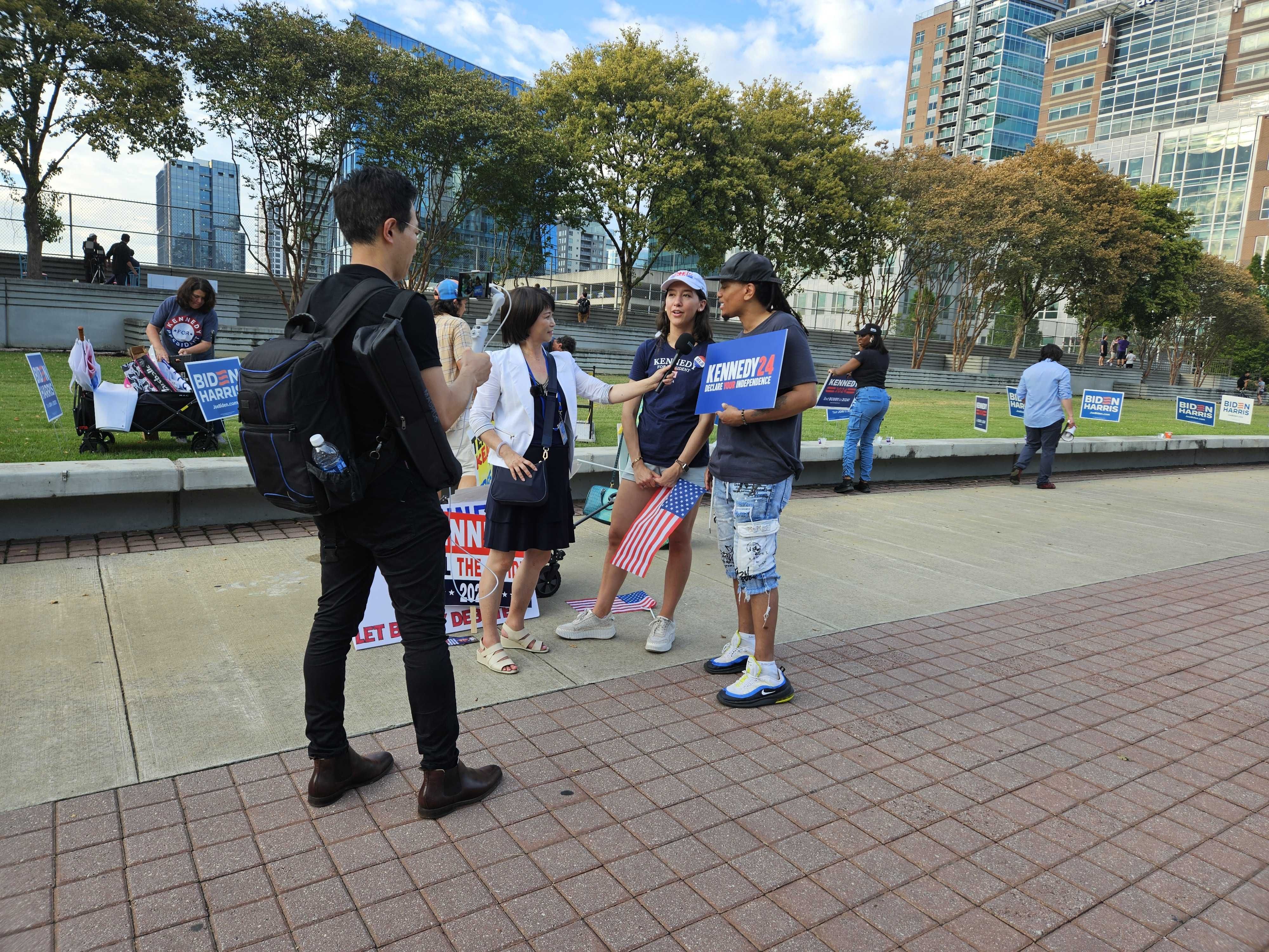 Two RFK supporters take questions from media about why the support the candidate.